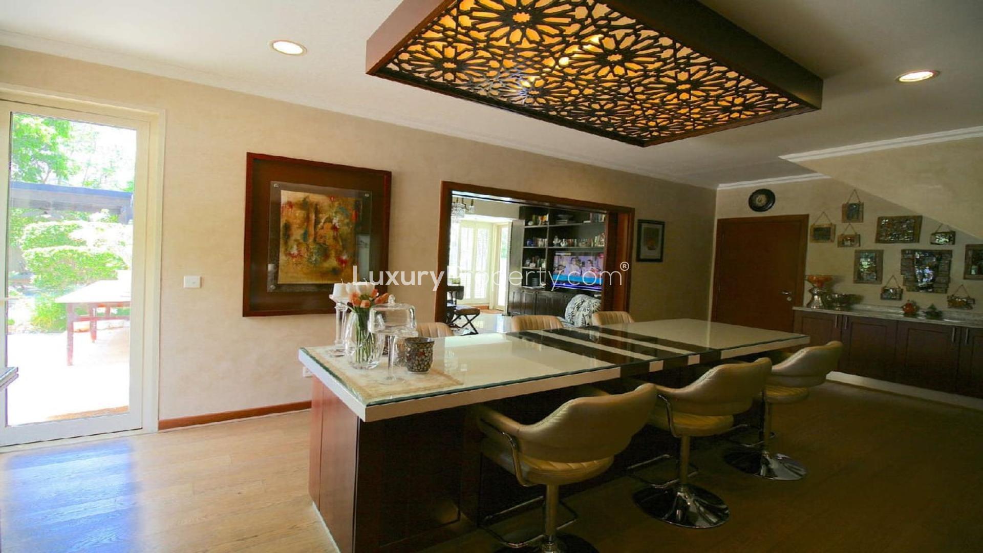 Modern kitchen interior in upgraded 5-bedroom villa, Saheel, Arabian Ranches, with stylish decor