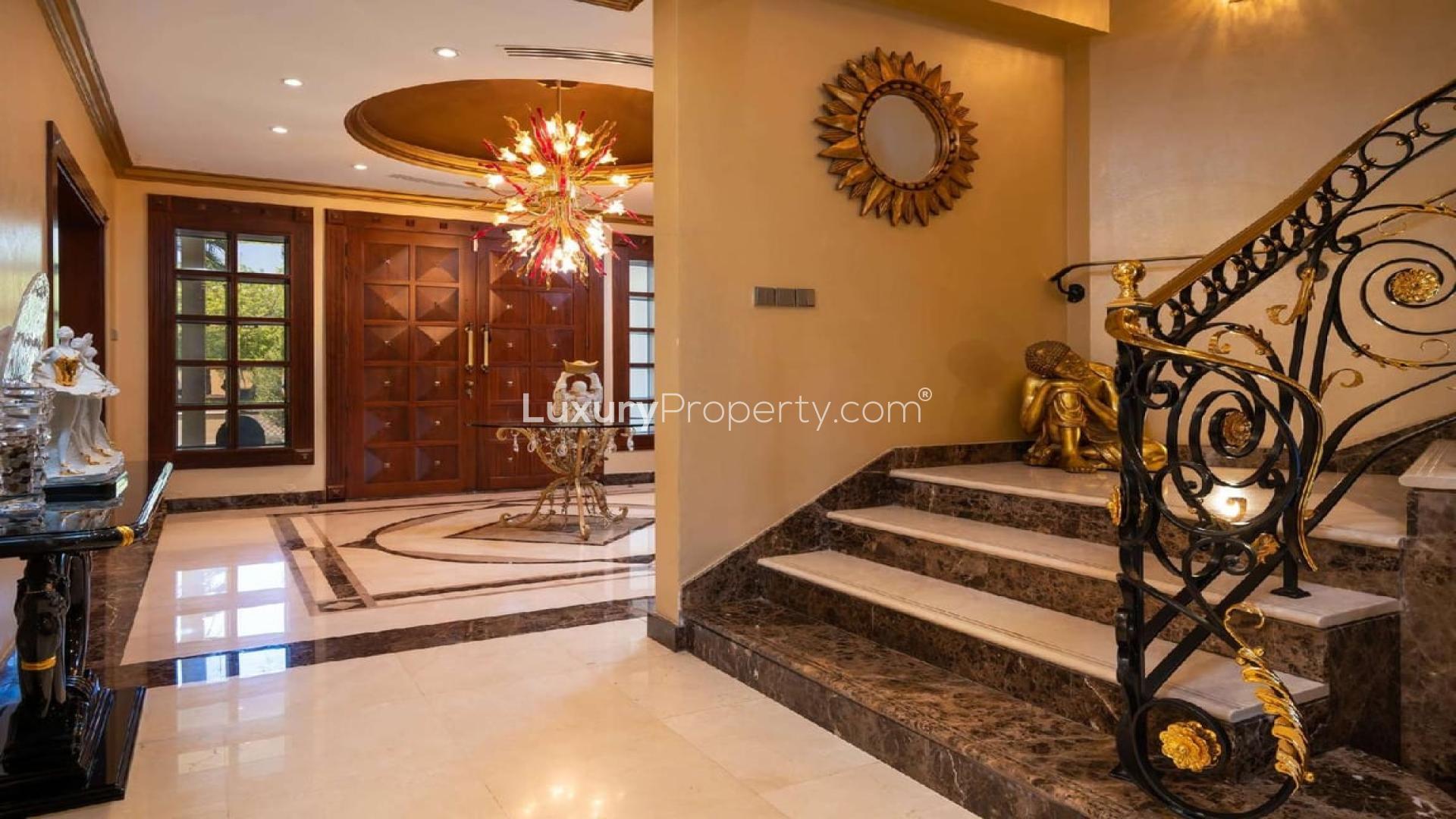 Luxurious living room in 5-bedroom villa, Emirates Hills, Sector R, with modern decor