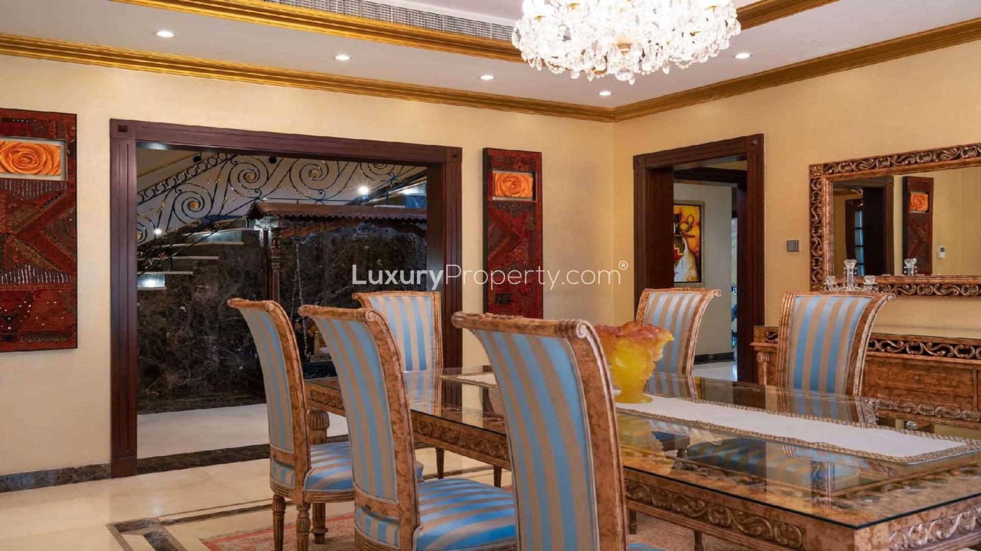 Luxurious villa pool and garden view in Emirates Hills, Sector R, available for rent
