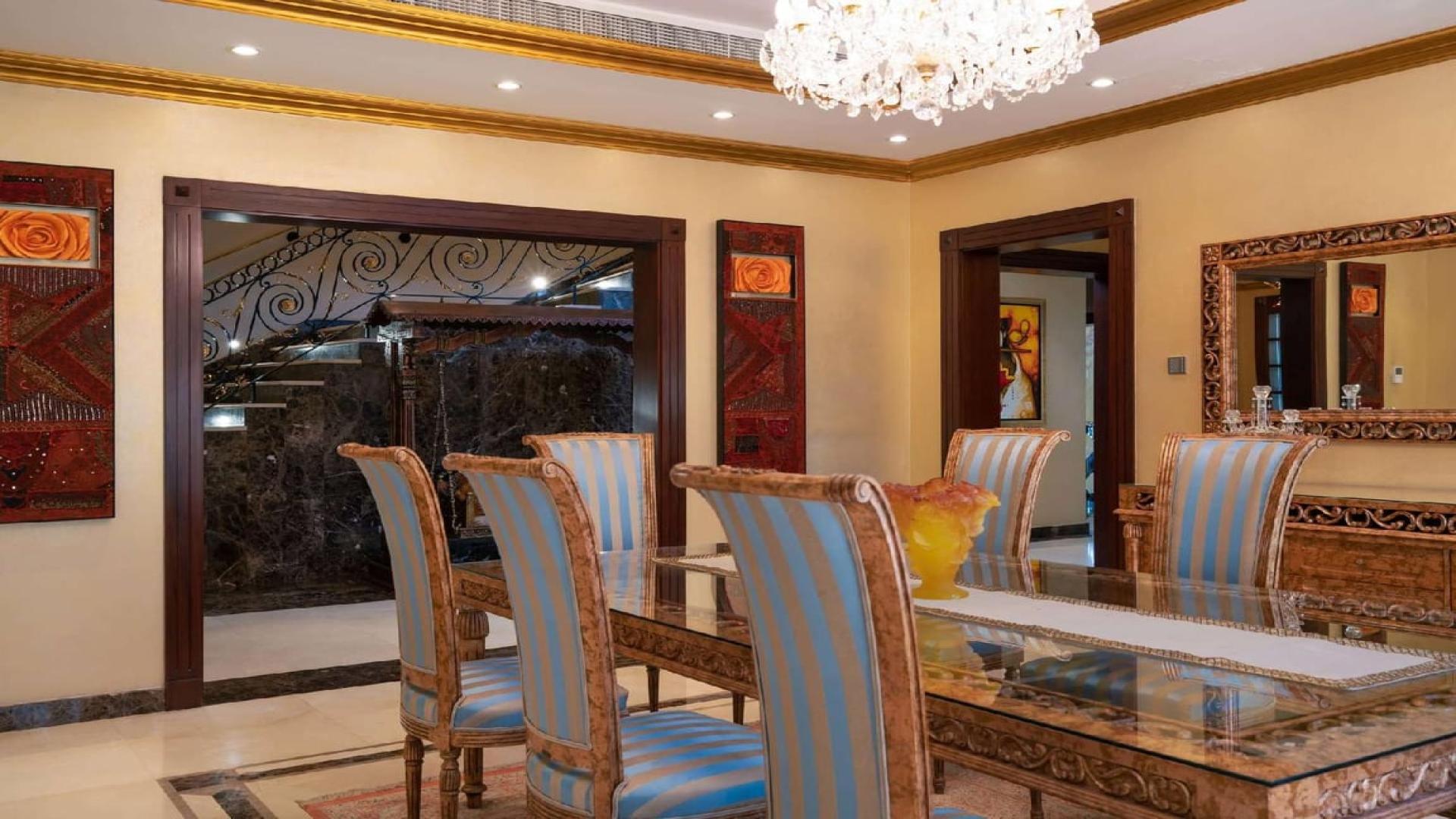 Luxurious villa pool and garden view in Emirates Hills, Sector R, available for rent