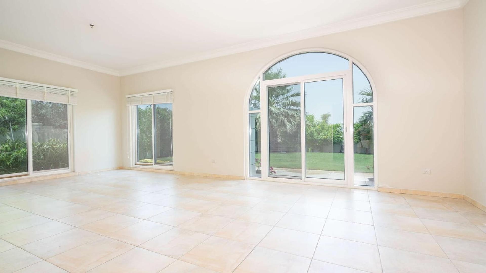 Immaculate 5-bedroom villa exterior in Victory Heights, Dubai Sports City, for rent