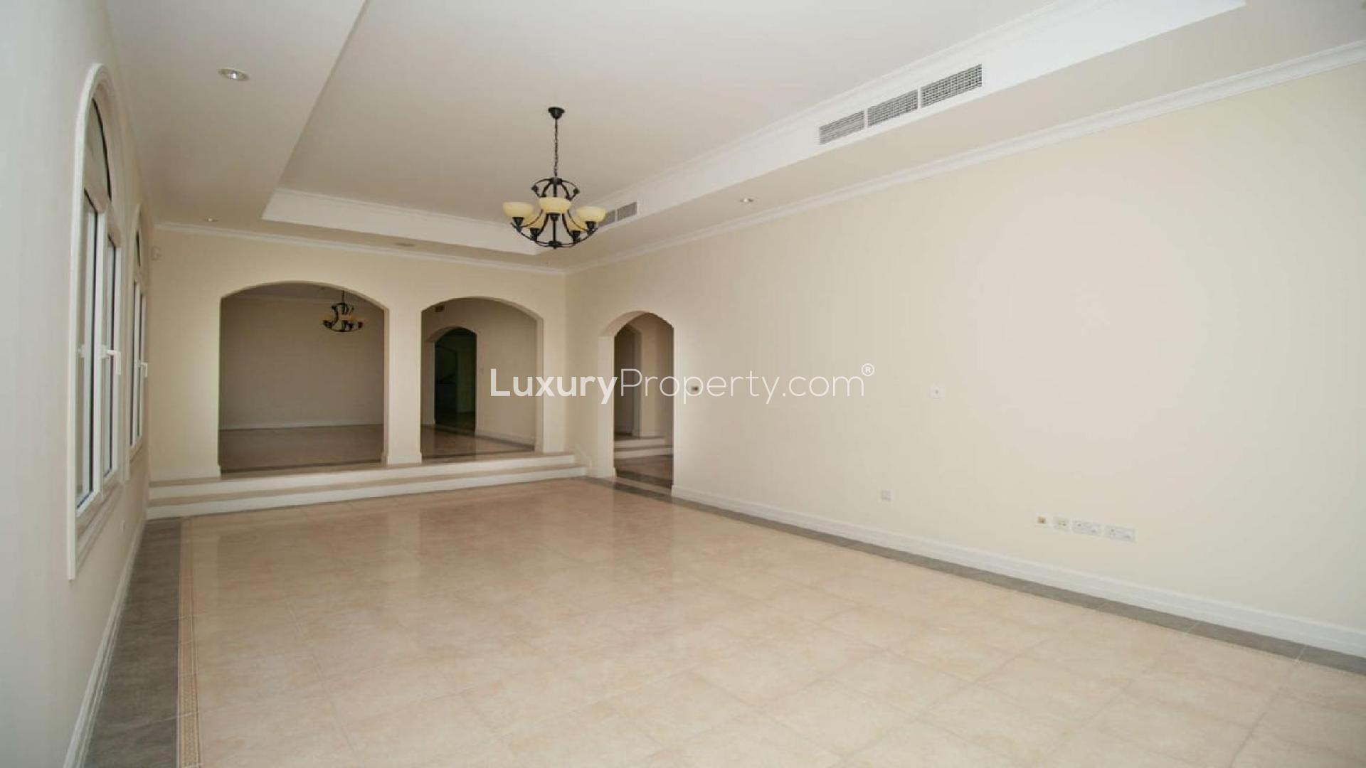Luxury 5-bedroom villa exterior in Sienna Lakes, Jumeirah Golf Estates, for rent