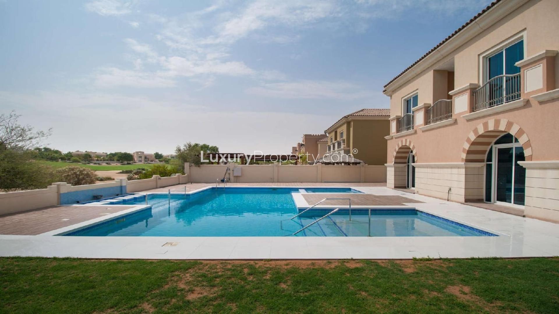 Villa with pool in Victory Heights, Dubai Sports City, for rent. Golf views, resort-style yard