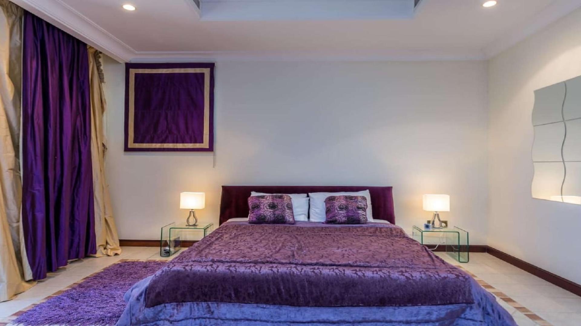 Luxurious entryway in Palm Jumeirah Garden Home villa with elegant chairs and decor