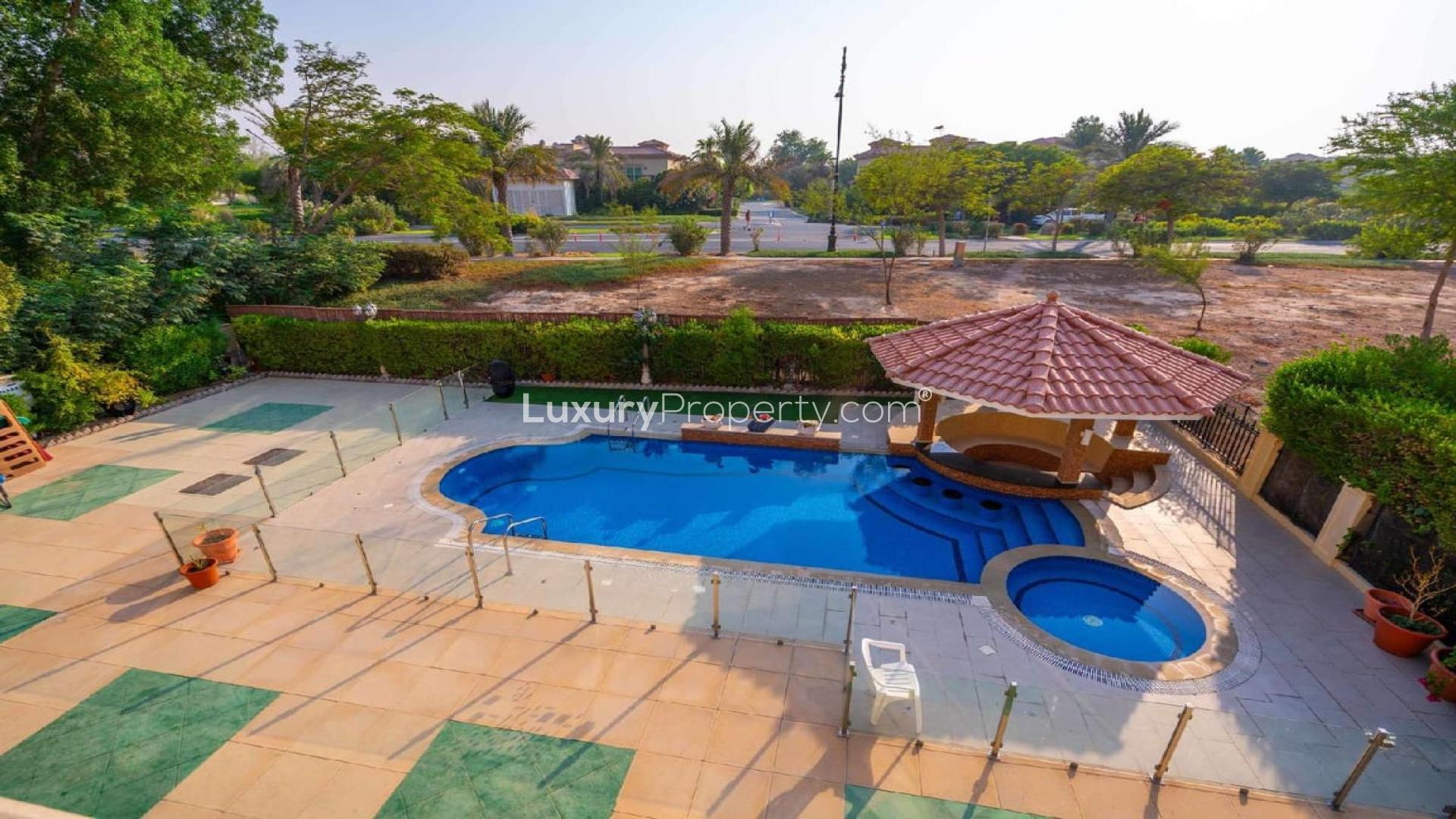 Front view of luxury 5-bedroom villa in Jumeirah Islands, European Clusters, with garden