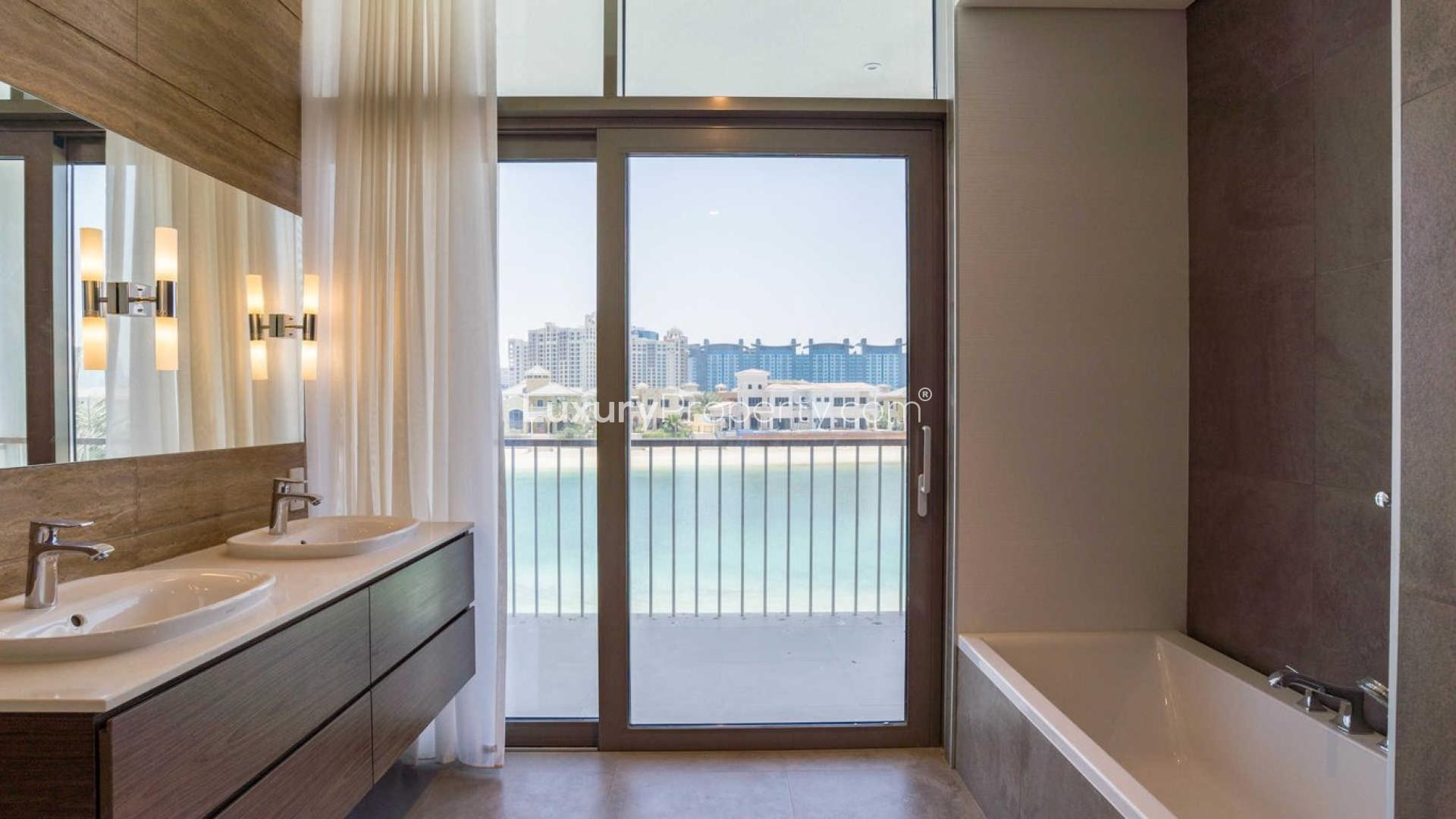 Luxury 5-bedroom villa exterior on Palm Jumeirah, modern design, available for rent