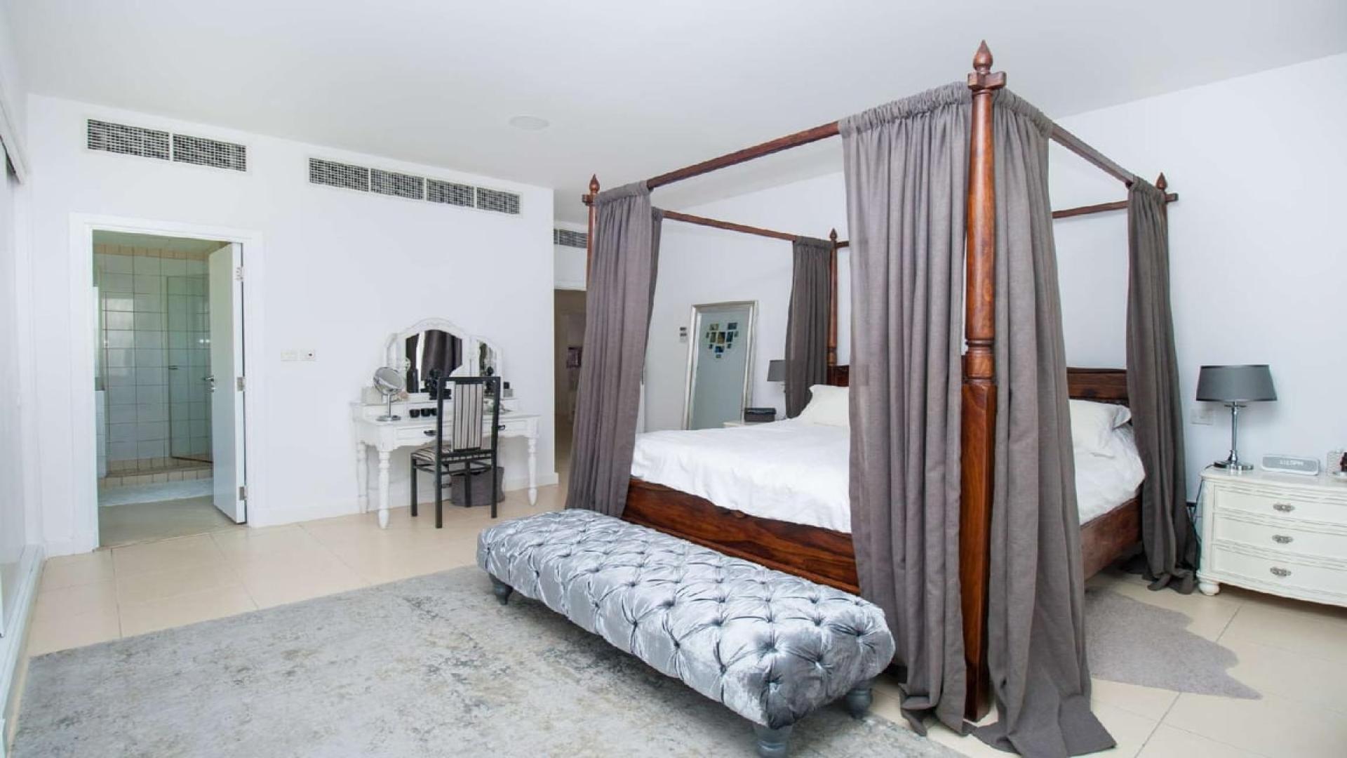 Interior of 5-bedroom villa in Saheel, Arabian Ranches featuring modern staircase and decor