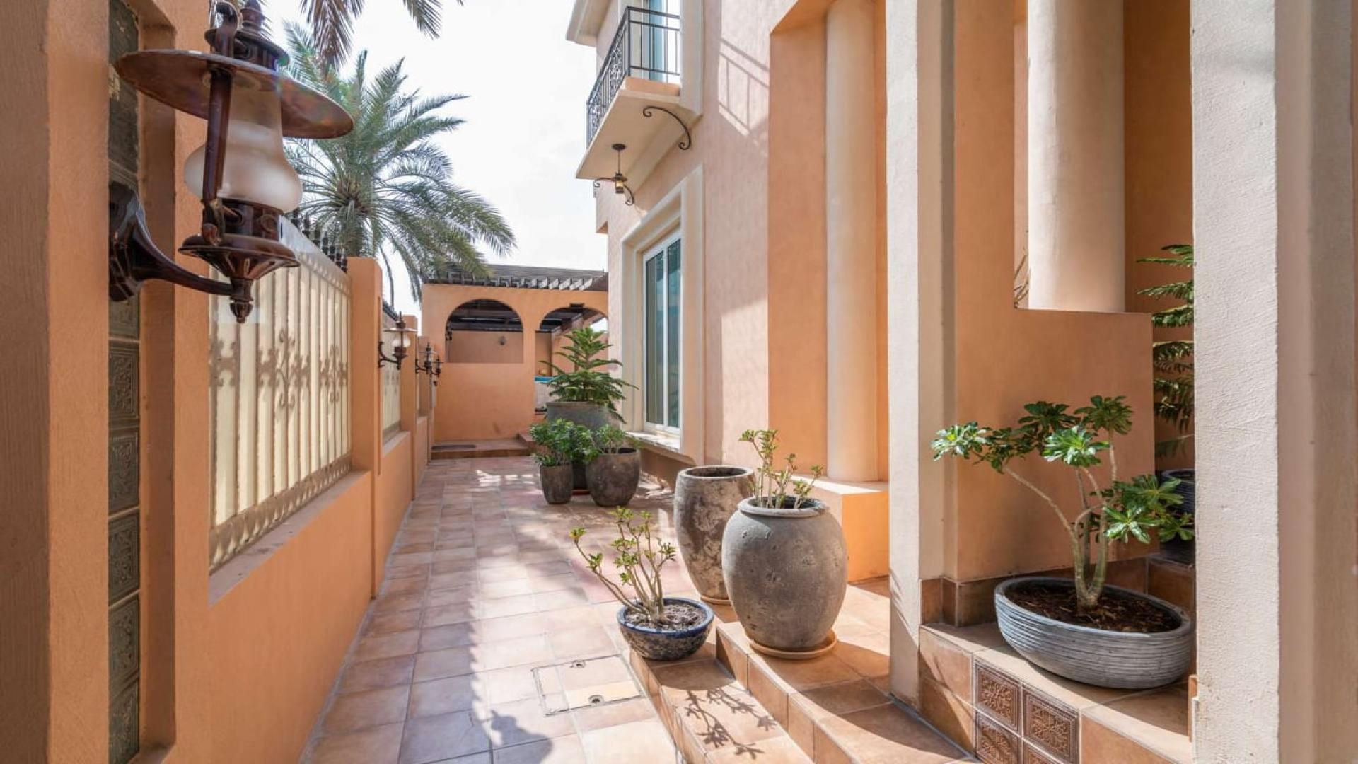 Mediterranean villa exterior with garden in Al Sufouh 1, available for rent