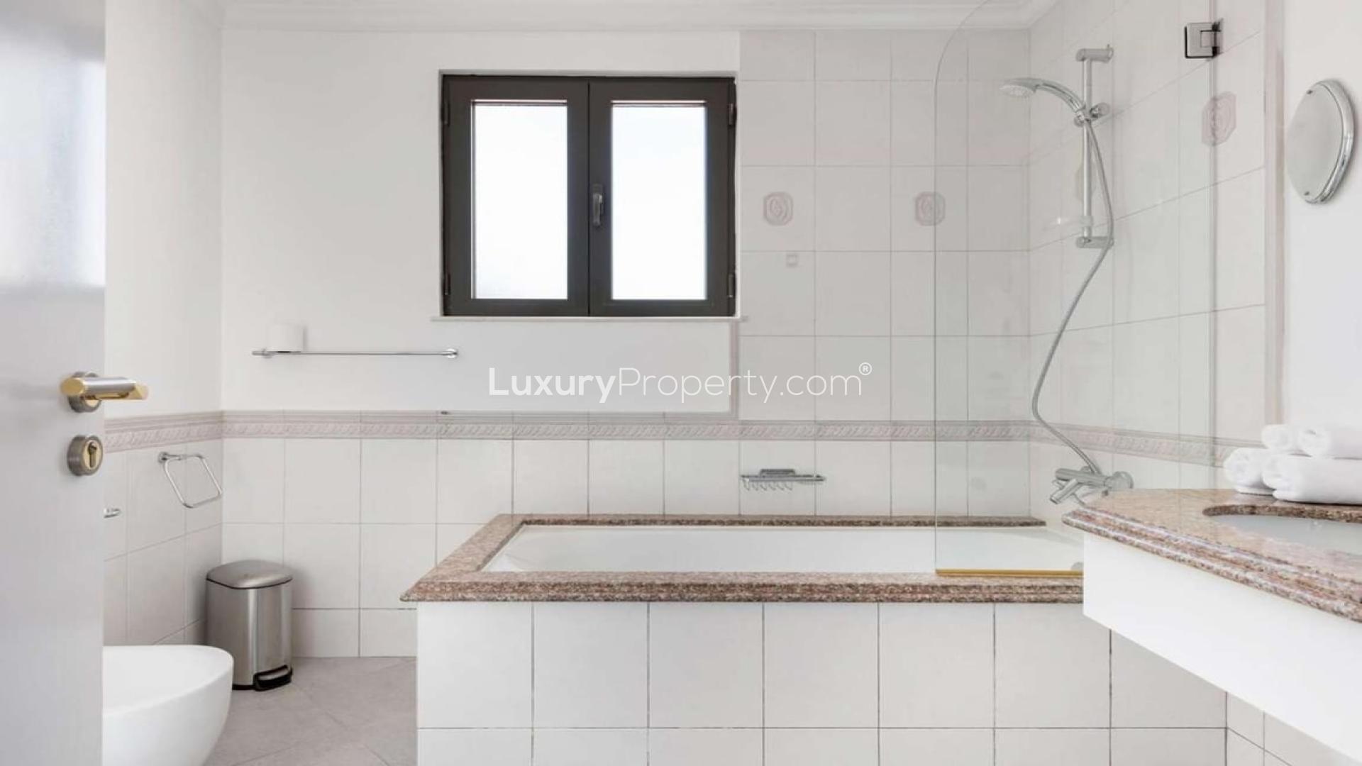 Modern 5-bedroom villa exterior in Garden Homes, Palm Jumeirah available for short-term rent