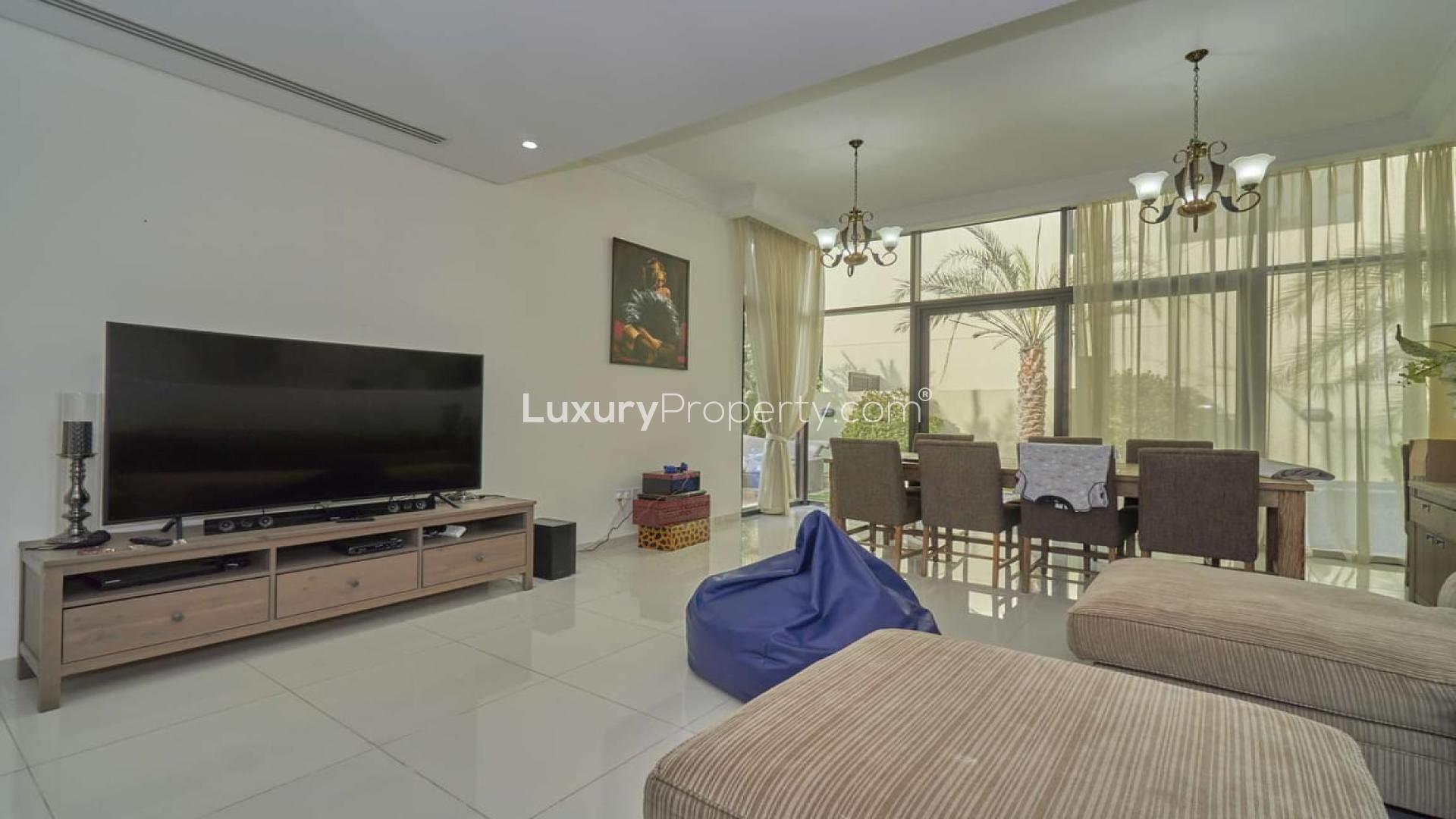 Elegant living room in 5-bedroom villa, Silver Springs, Damac Hills, with modern decor