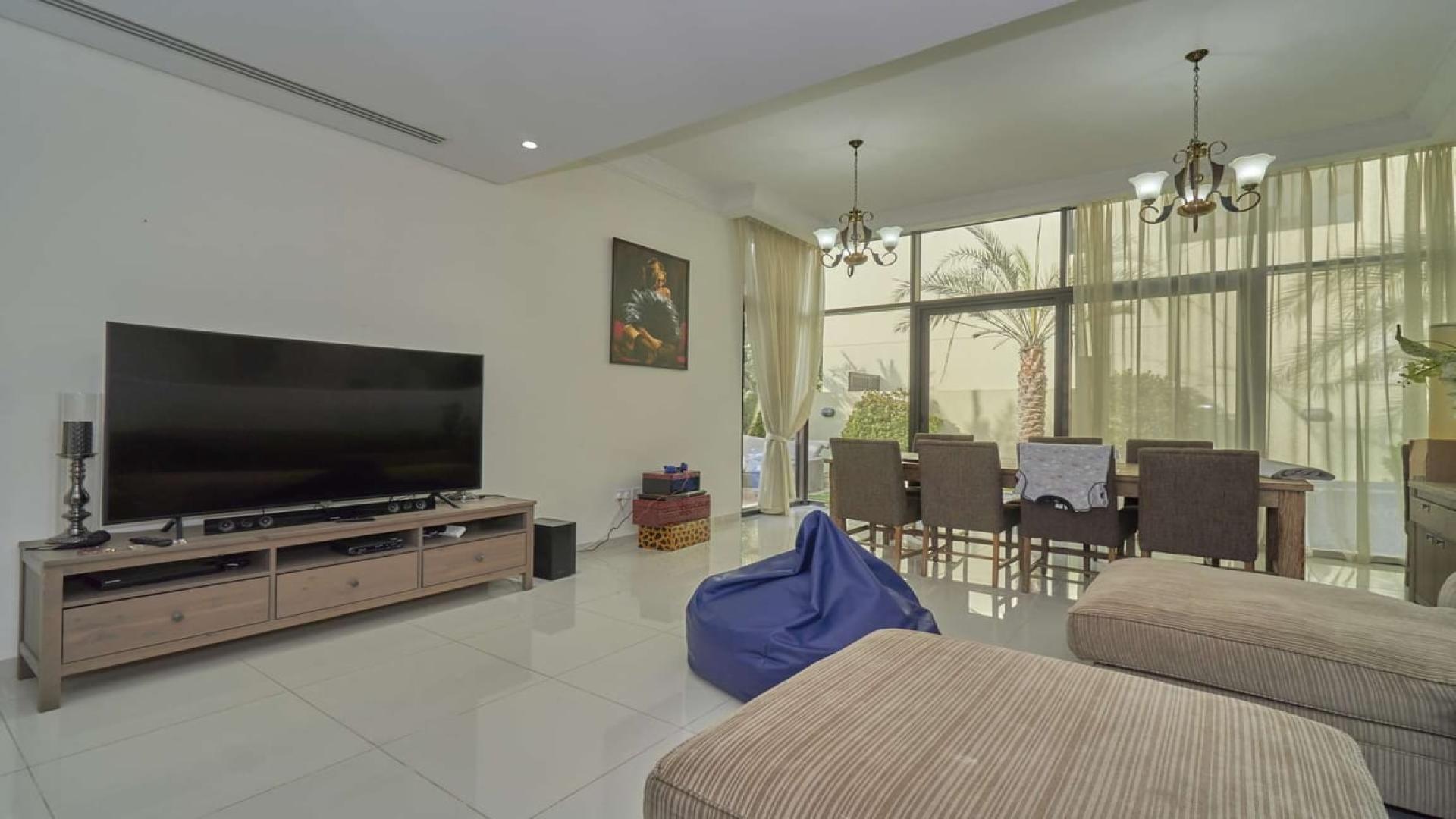 Elegant living room in 5-bedroom villa, Silver Springs, Damac Hills, with modern decor