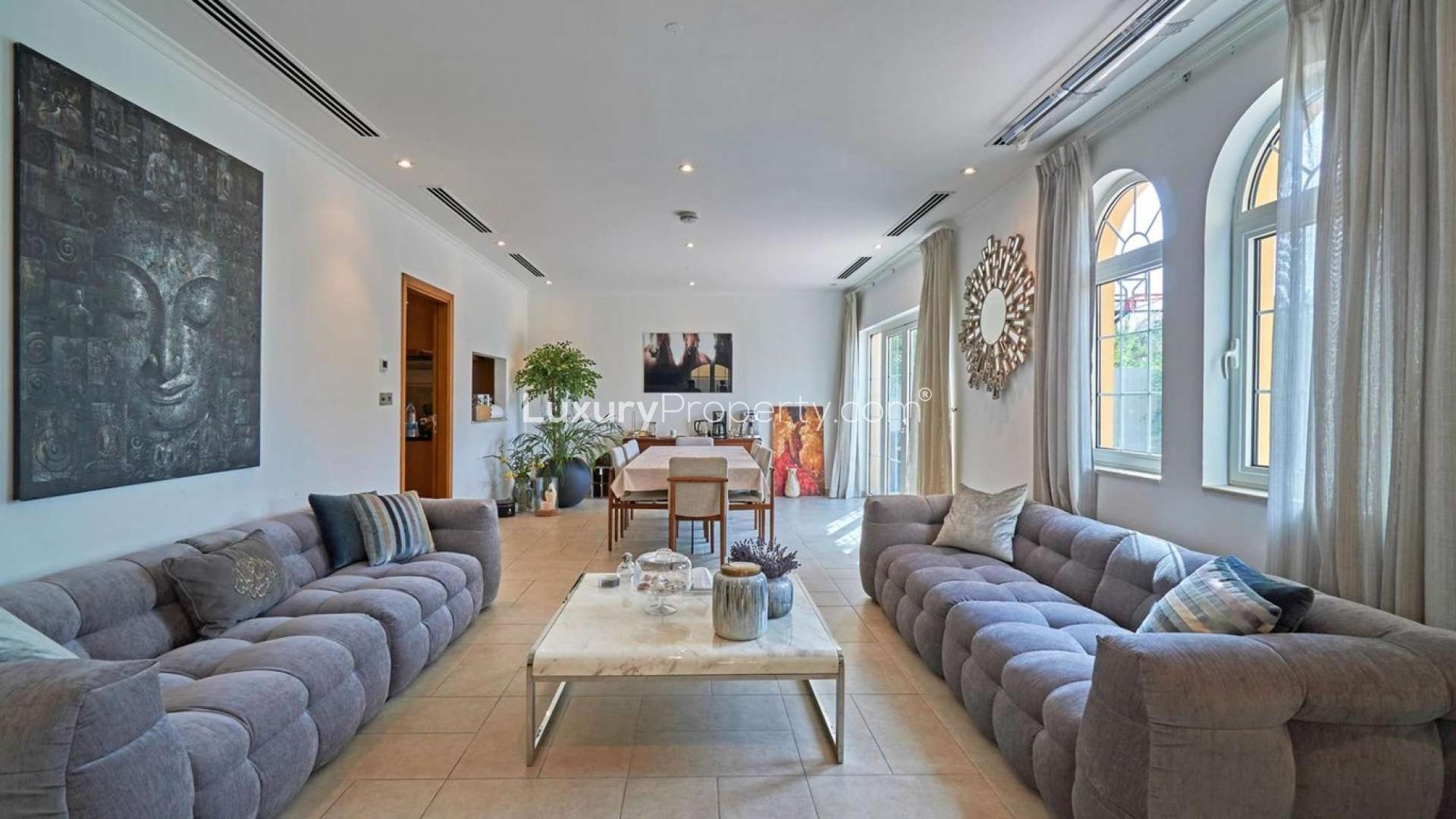 Spectacular 5-bedroom villa exterior in Jumeirah Park, Legacy, with landscaped garden pathway