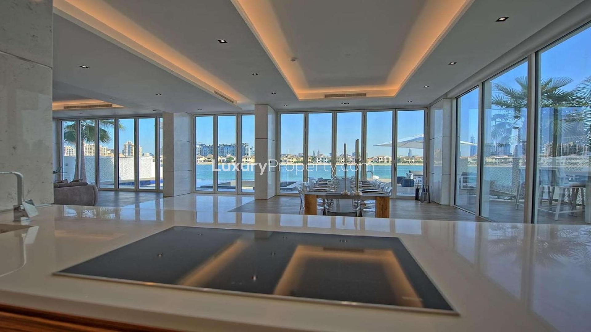 Luxurious dining area with beach view in Palm Jumeirah villa for rent