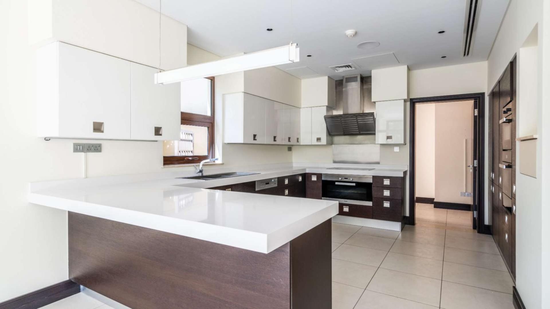 Luxury five-bedroom villa exterior, private pool, Sanctuary Falls, Jumeirah Golf Estates, for rent