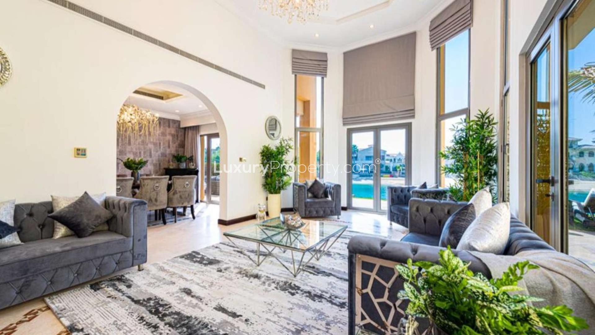 Luxurious living room in modern Palm Jumeirah villa for rent, featuring elegant furnishings