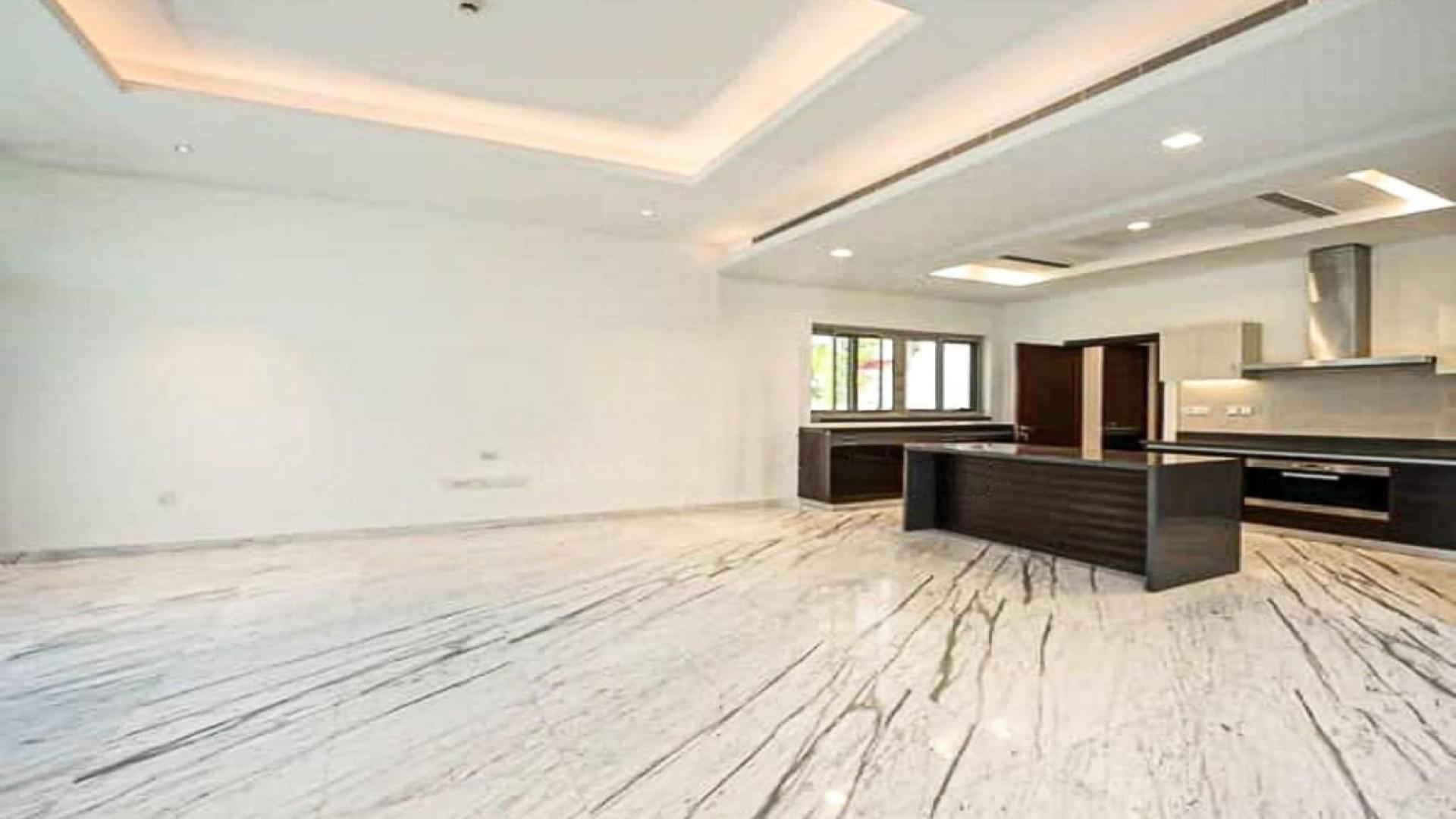 Open-plan kitchen and living area in District One villa, Mohammed Bin Rashid City