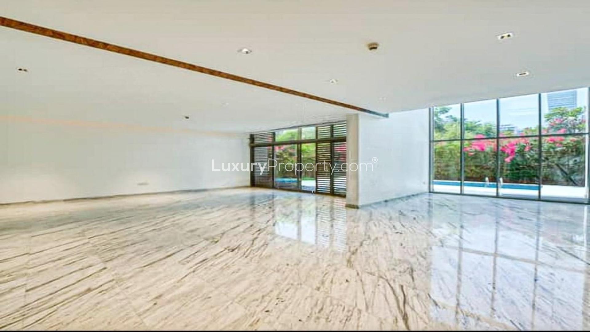 Spacious living area with marble flooring in District One villa, Mohammed Bin Rashid City
