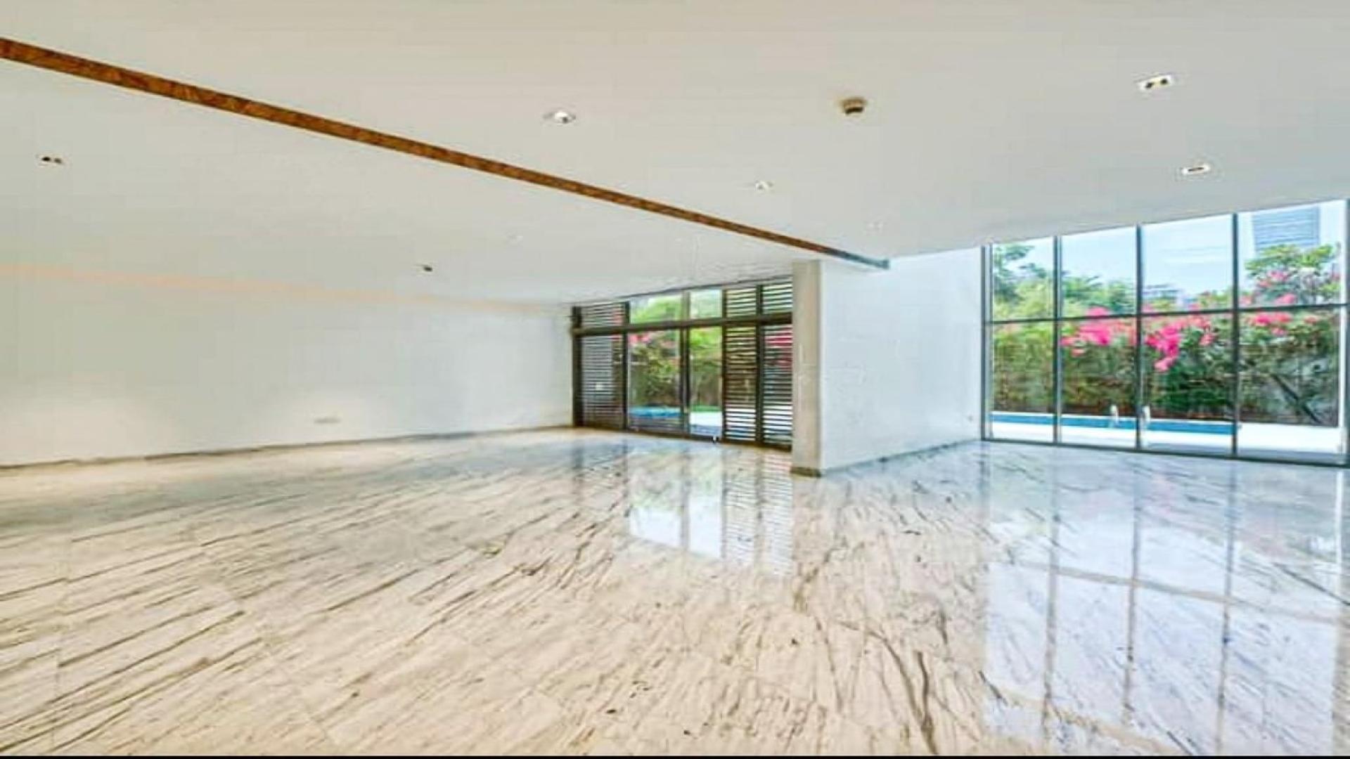 Spacious living area with marble flooring in District One villa, Mohammed Bin Rashid City
