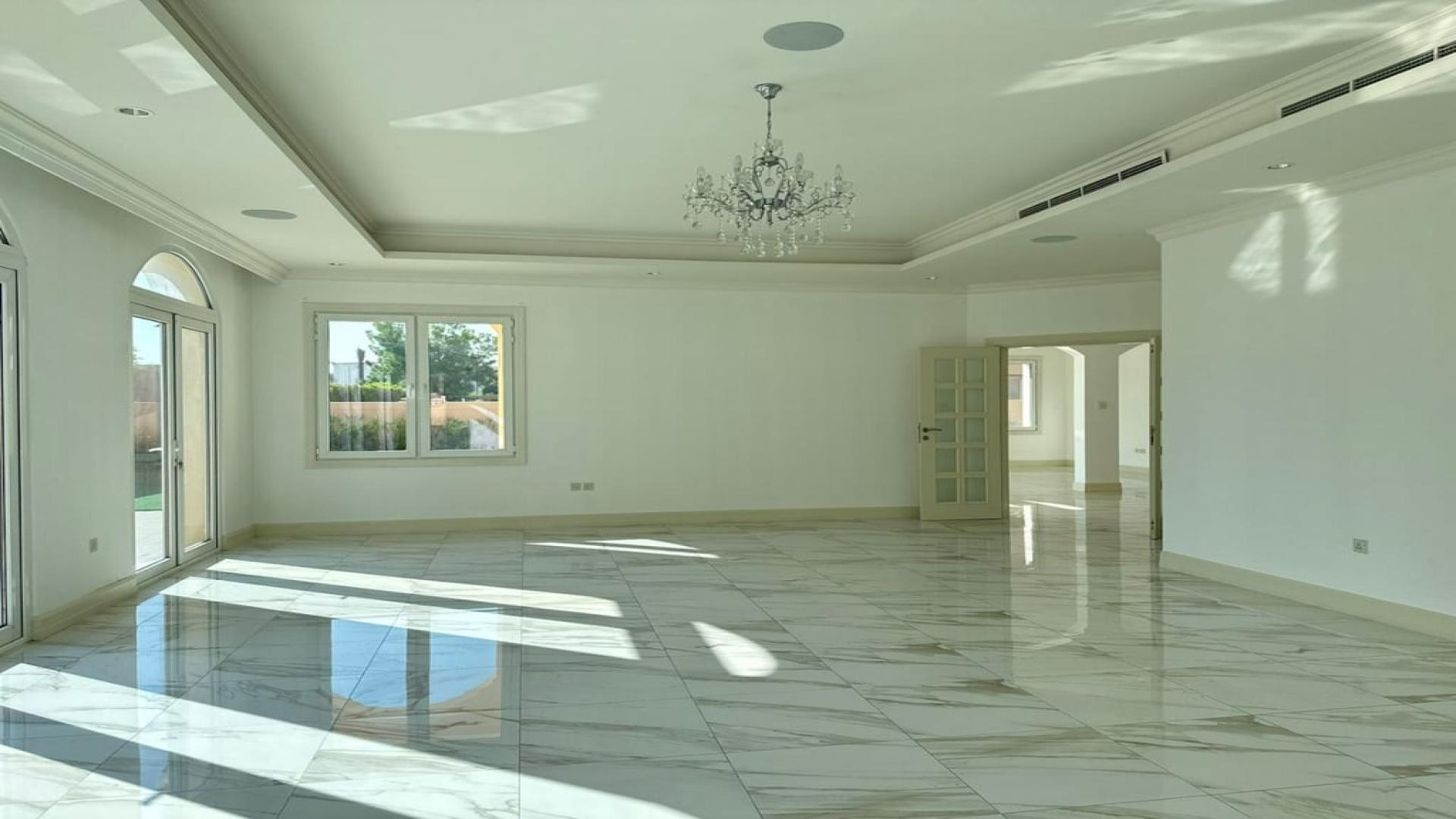 Exterior view of Sienna Lakes Villa with pool in Jumeirah Golf Estates, Fire community