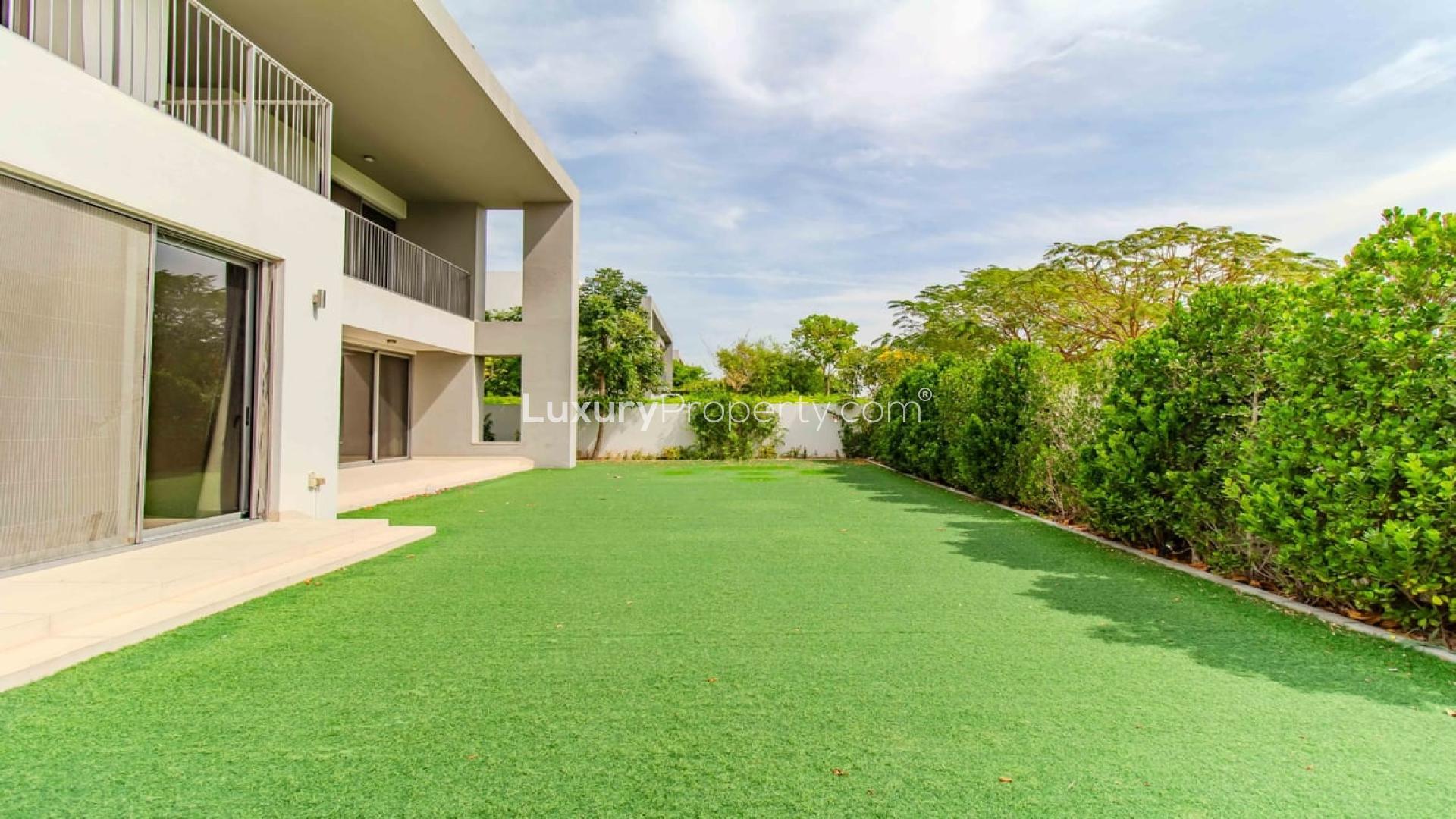 Modern 5-bedroom villa exterior, lush garden, Sidra Villas, Dubai Hills Estate rental