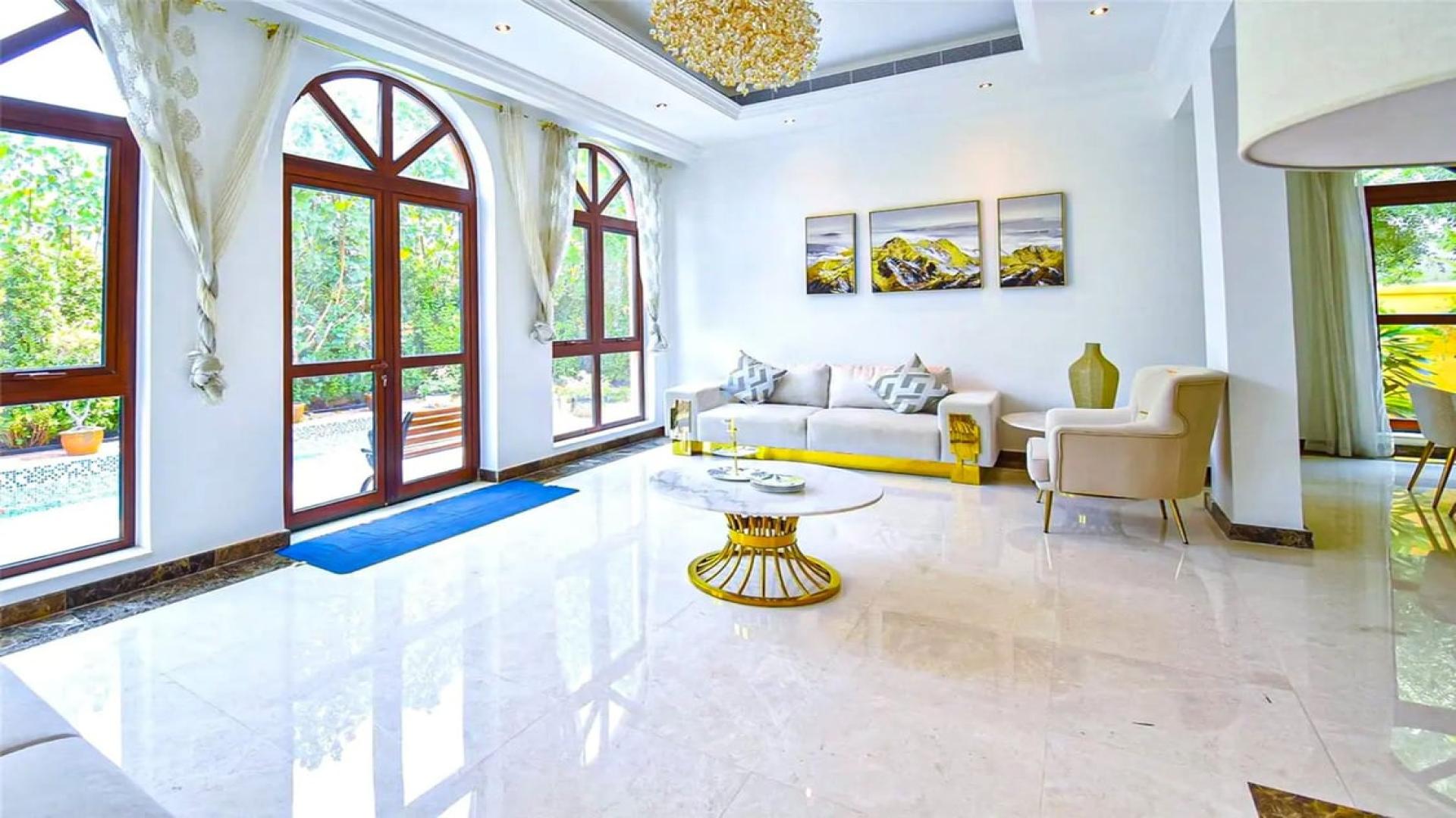 Luxurious living room in fully upgraded villa, Jumeirah Golf Estates, elegant furnishings, spacious layout