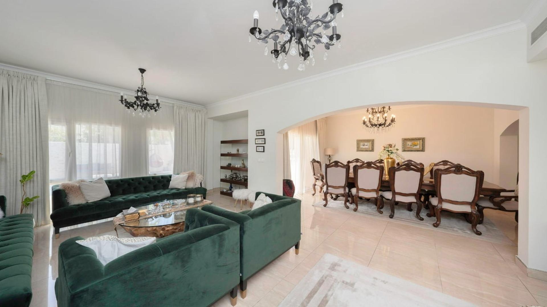 Luxurious living and dining area in fully renovated Meadows 2 villa for rent