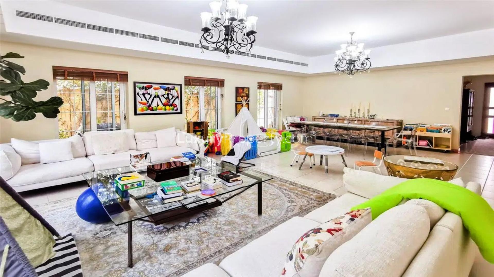 Outdoor pool and seating area at Terra Nova Villa, Arabian Ranches, for rent