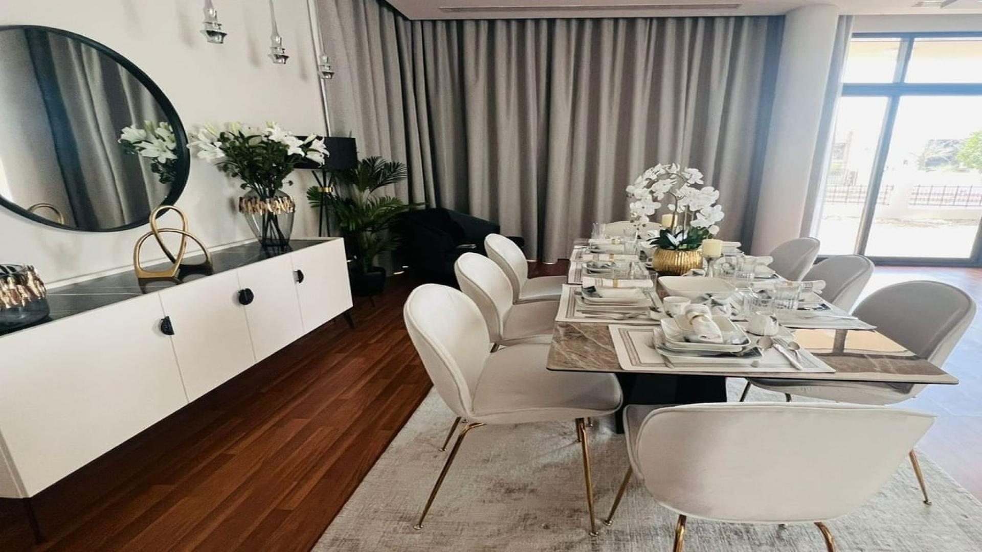 Luxurious dining area in fully furnished 5-bedroom villa, Picadilly Green, Damac Hills