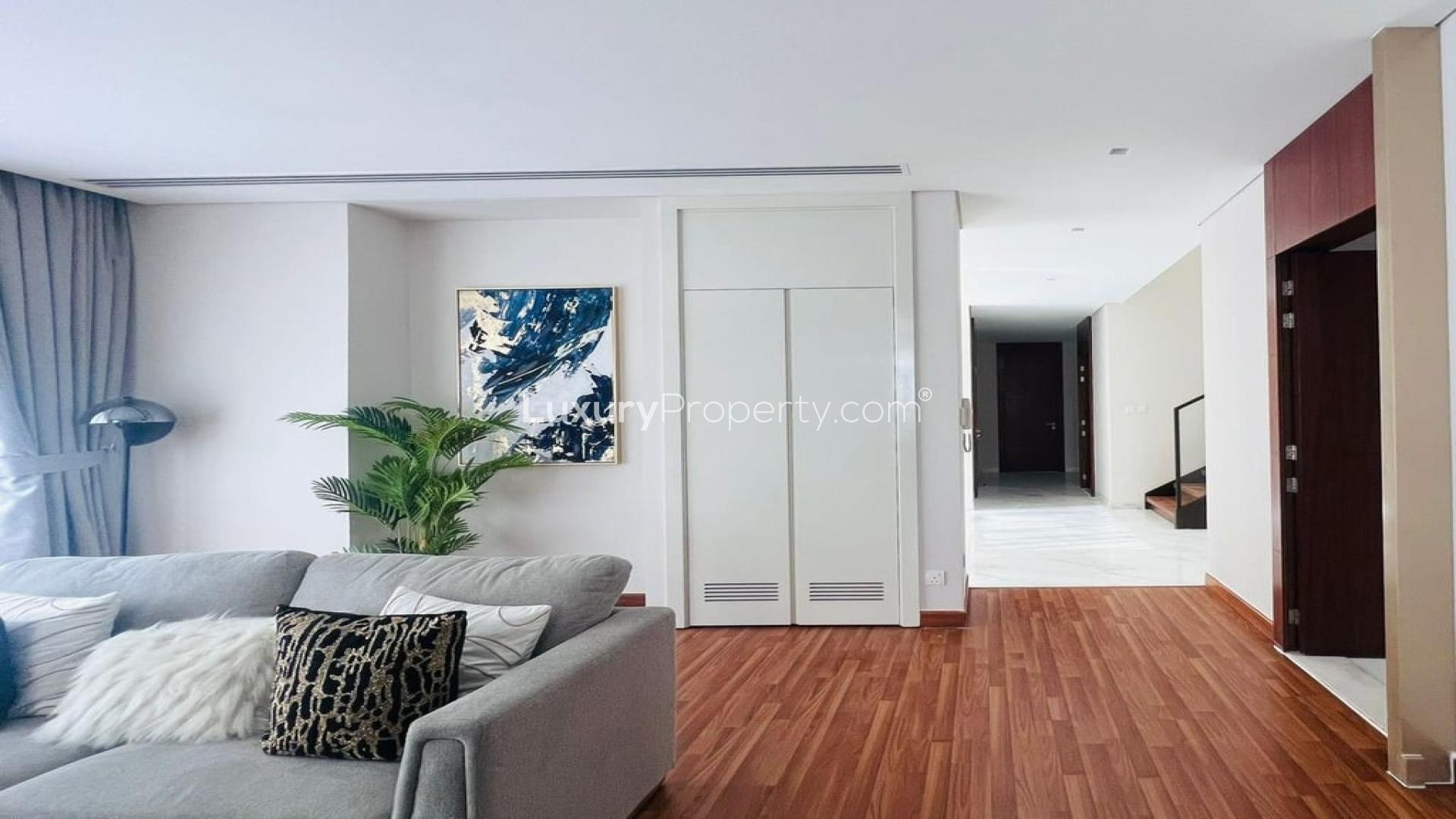 Modern living and dining area in fully furnished villa, Damac Hills, Picadilly Green