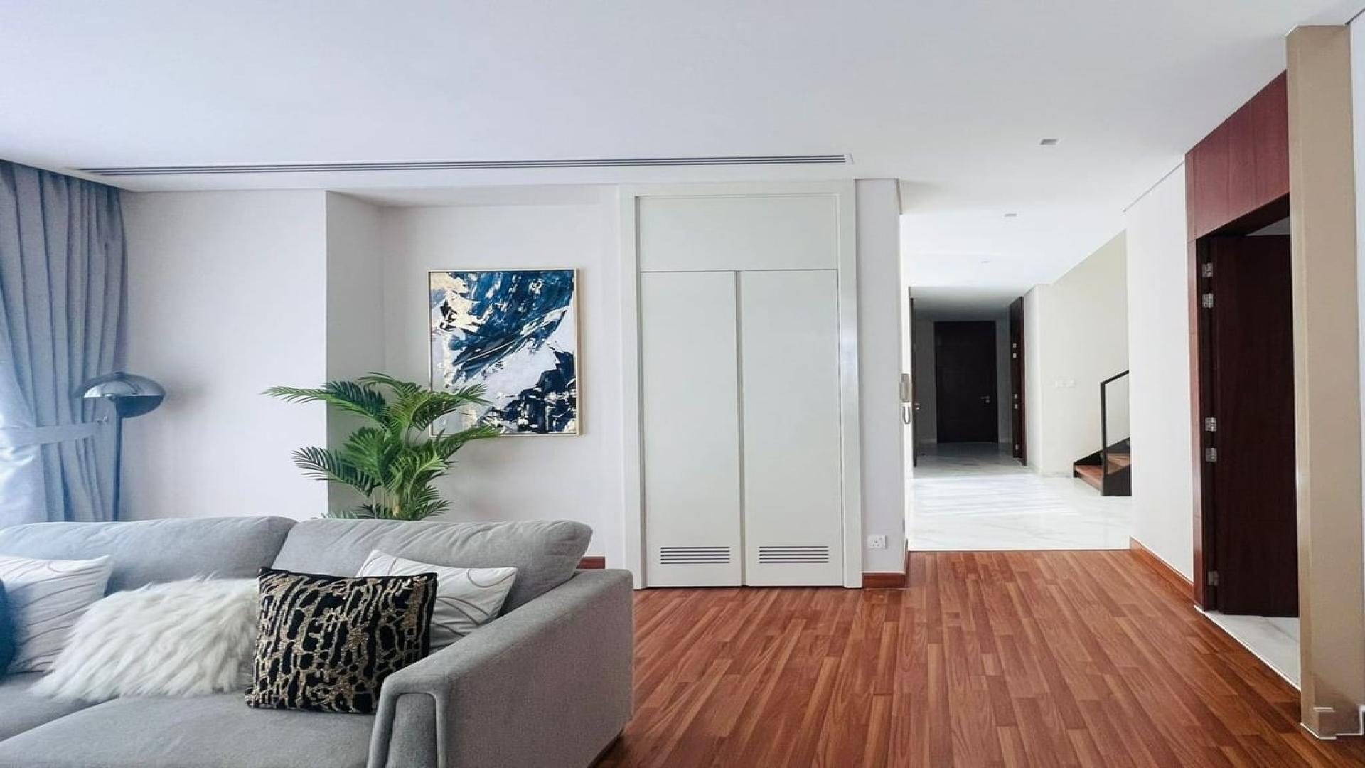 Modern living and dining area in fully furnished villa, Damac Hills, Picadilly Green