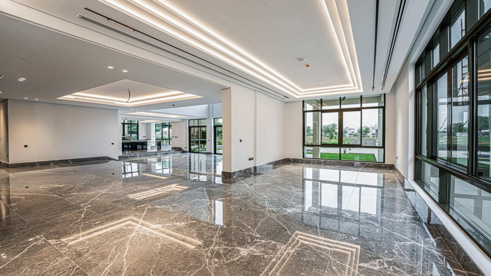 Stunning custom villa exterior with garden in Jumeirah Golf Estates, Fire community, for rent