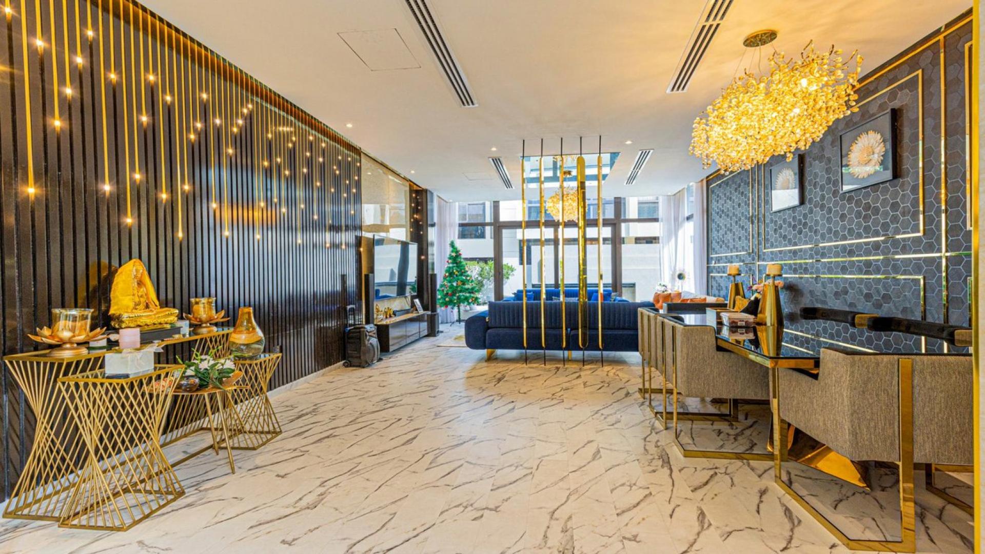 Luxurious living room in upgraded Damac Hills villa, Brookfield community, available for rent