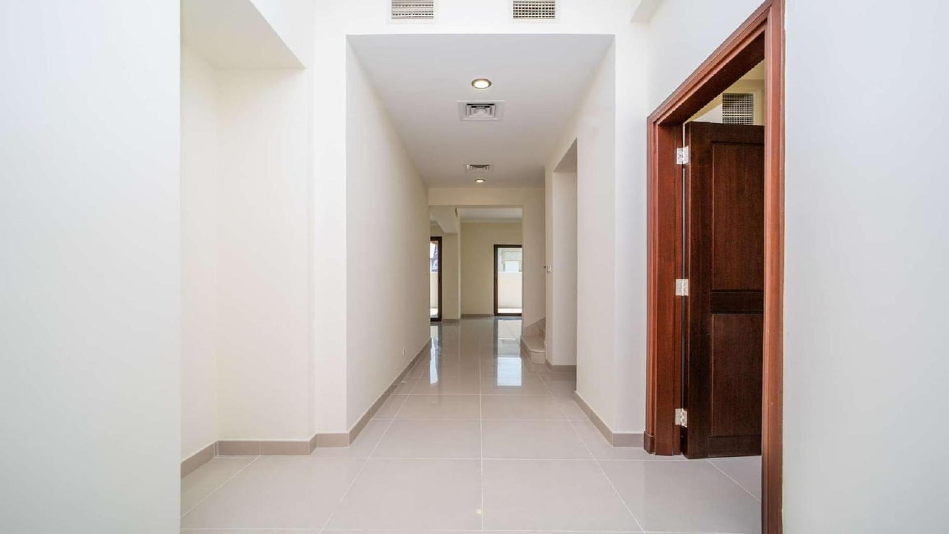 Upgraded kitchen with wooden cabinets in Samara villa, Arabian Ranches 2, available for rent