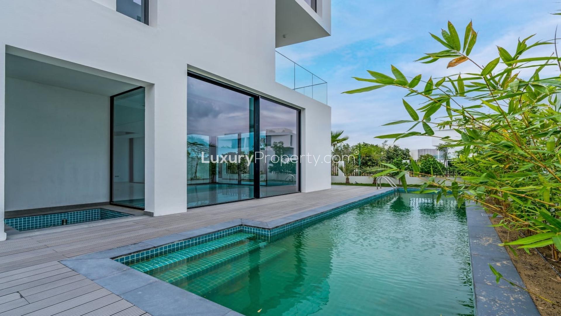 Spacious luxury villa interior with large windows in Chorisia 2, Al Barari for rent