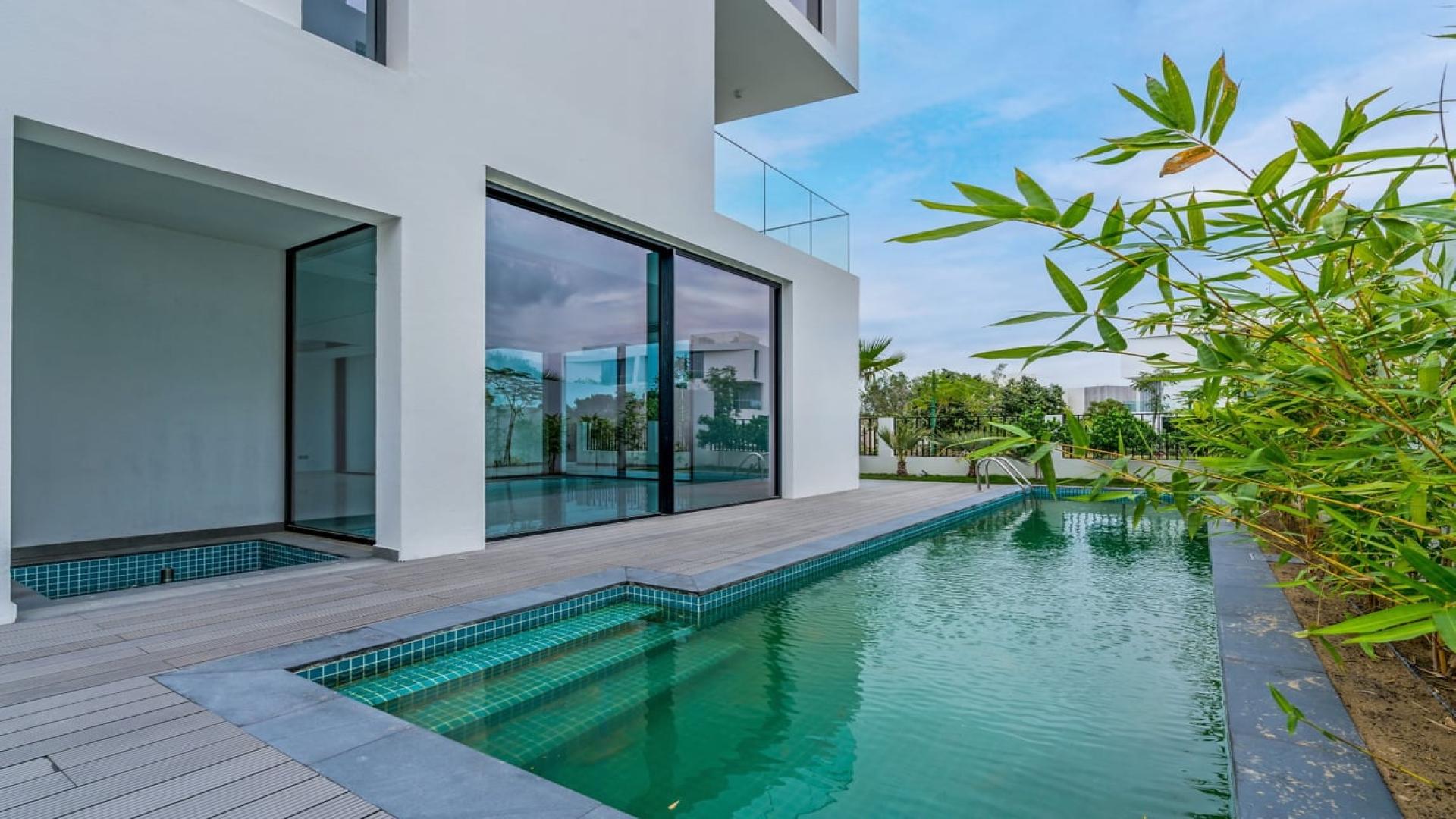 Spacious luxury villa interior with large windows in Chorisia 2, Al Barari for rent