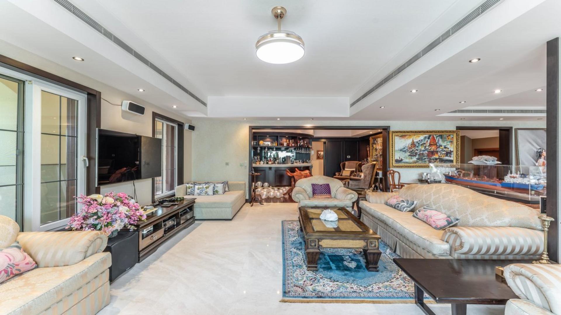 Lush garden with vibrant flowers at luxury villa in Mirador La Coleccion, Arabian Ranches