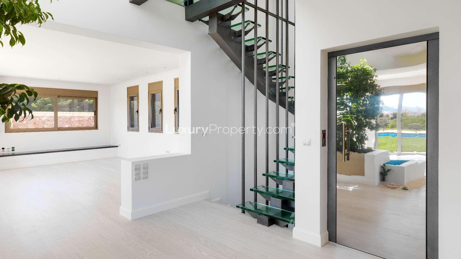 Luxurious Rafina villa with private pool, lush garden, and spacious outdoor area for sale