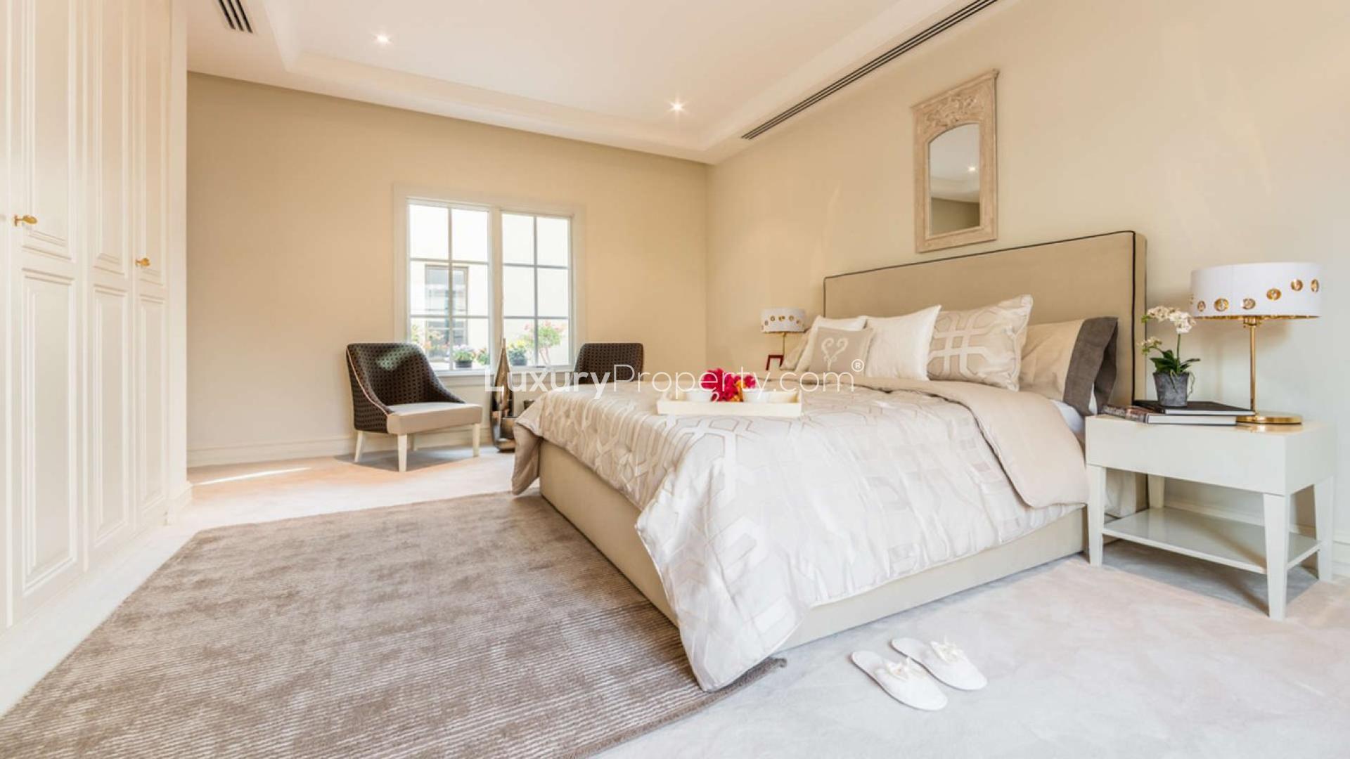 Elegant dining and living area in 5-bedroom villa, Redwood Avenue, Jumeirah Golf Estates