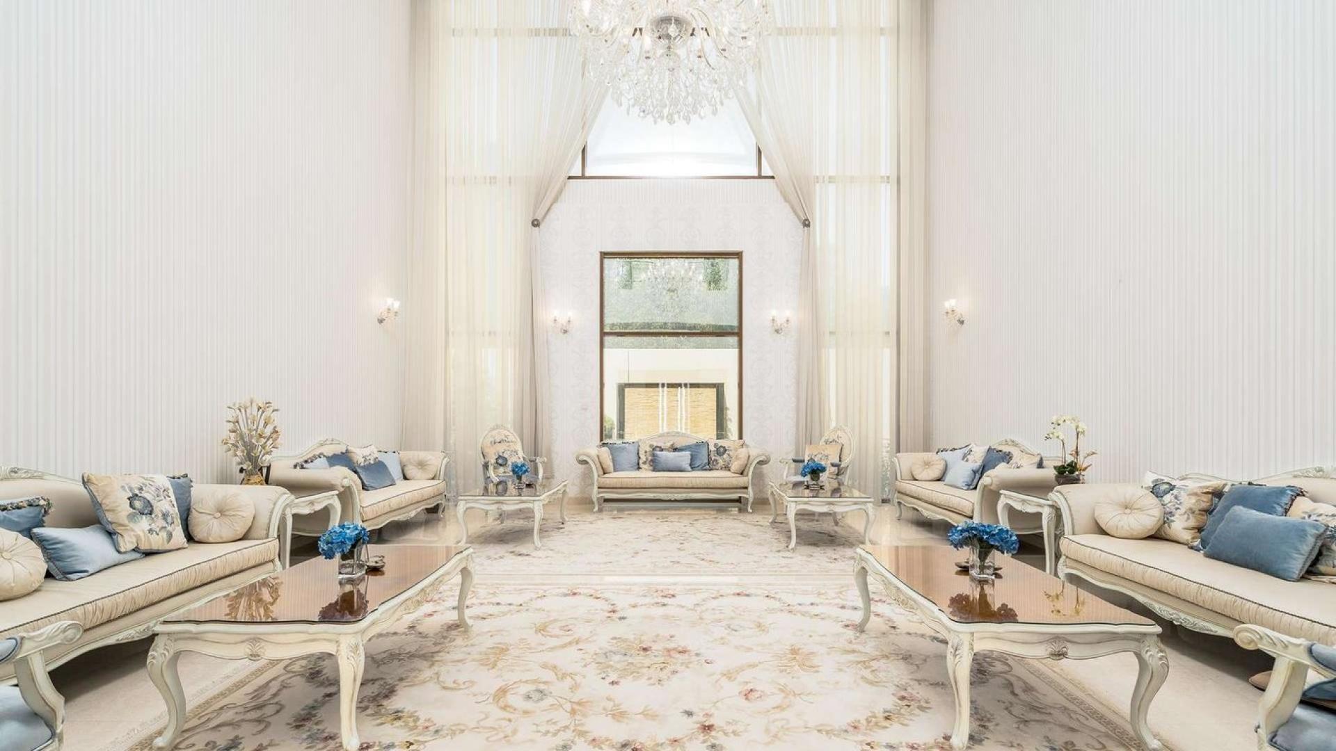 Modern luxury villa exterior in Meydan’s Millennium Estates, featuring minimalist design and lush greenery