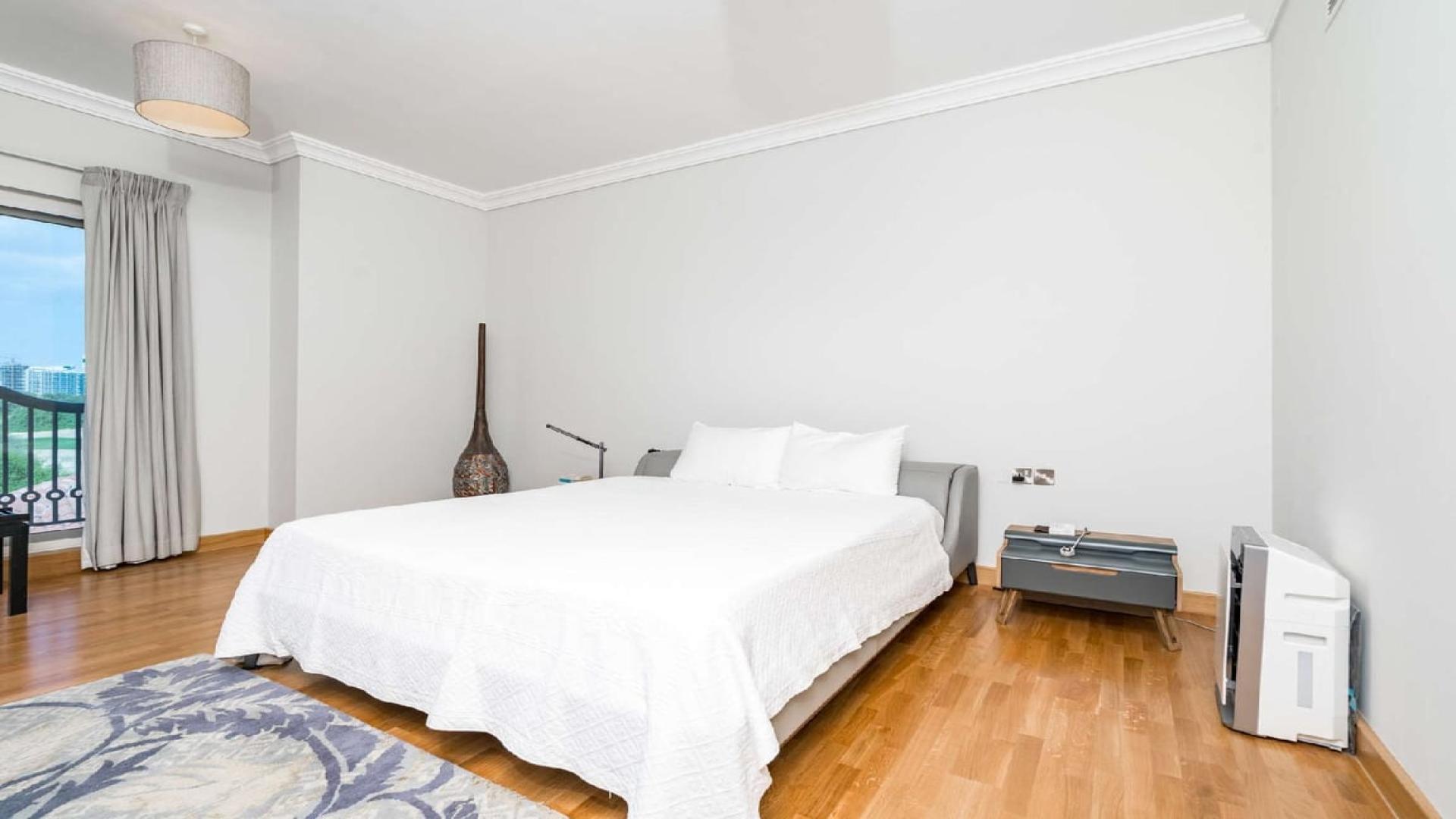 Luxury 5-bedroom villa exterior with garage in Victory Heights, Dubai Sports City