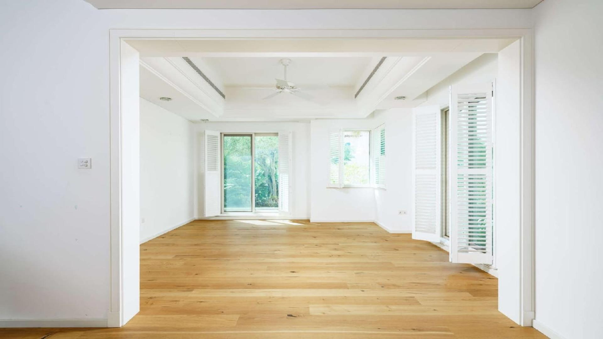 Arched pathway with swing in upgraded 5-bedroom villa, Victory Heights, Dubai Sports City