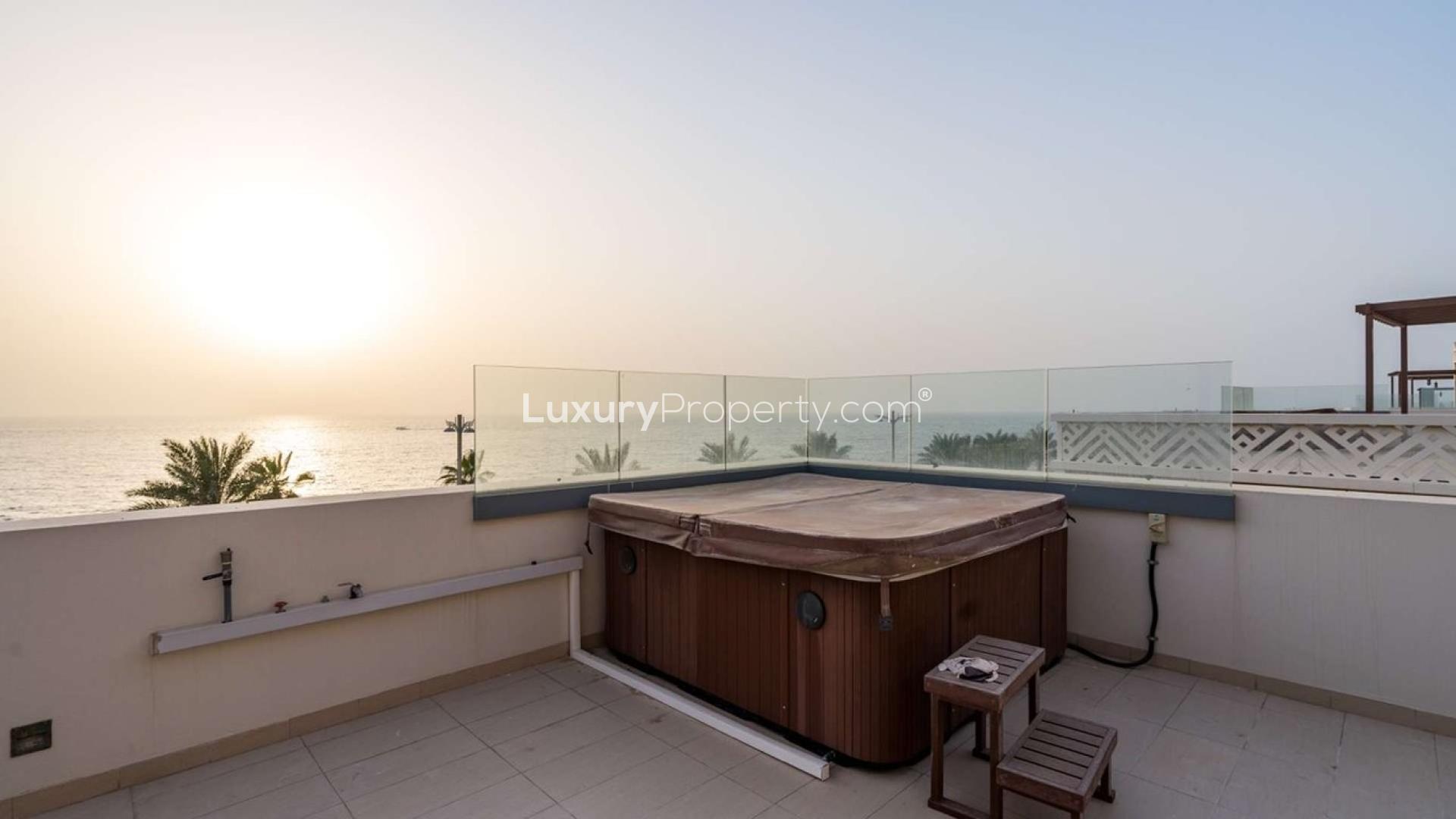 Spacious living room with sea views in Palm Jumeirah villa, Kingdom of Sheba