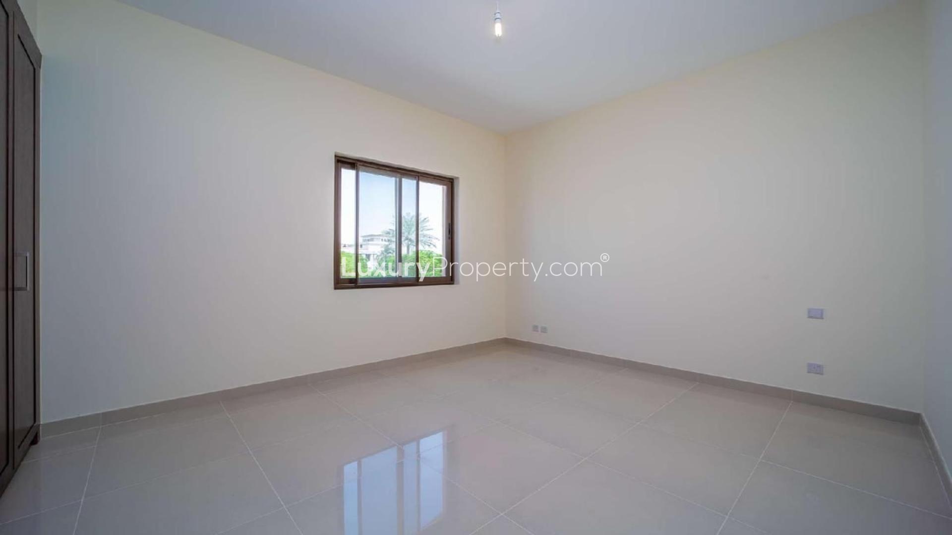 Spacious living room in Samara villa, Arabian Ranches 2 with large windows and tiled flooring