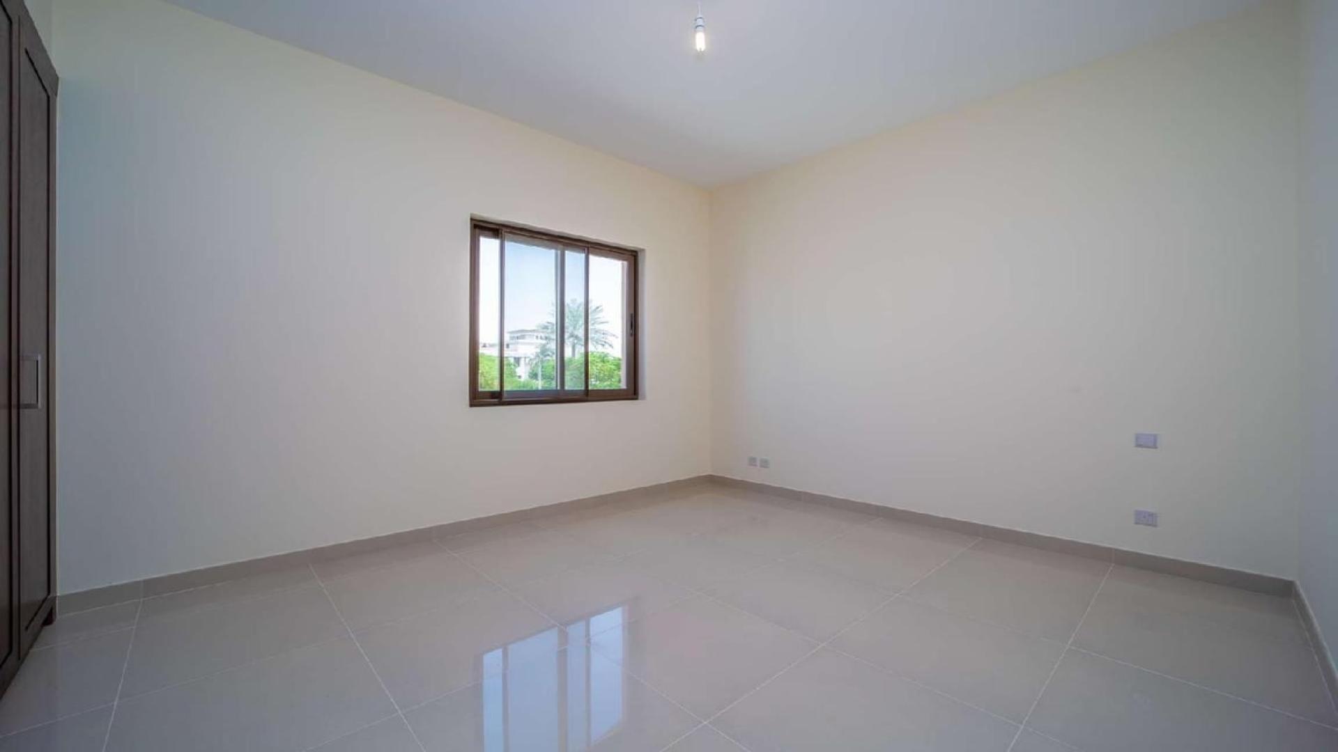 Spacious living room in Samara villa, Arabian Ranches 2 with large windows and tiled flooring