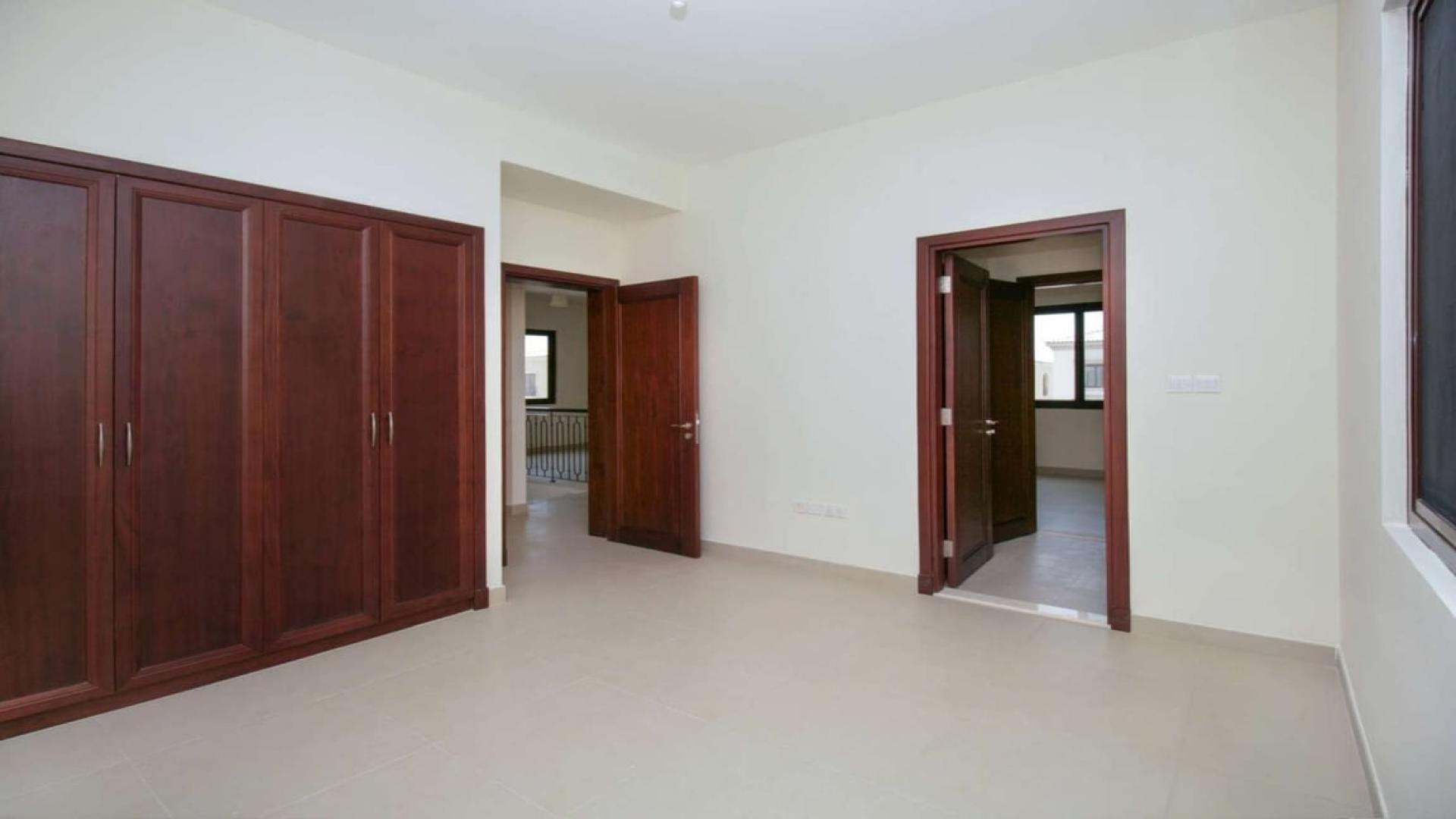 Spacious bedroom with built-in wardrobes in Lila Villa, Arabian Ranches 2, for sale
