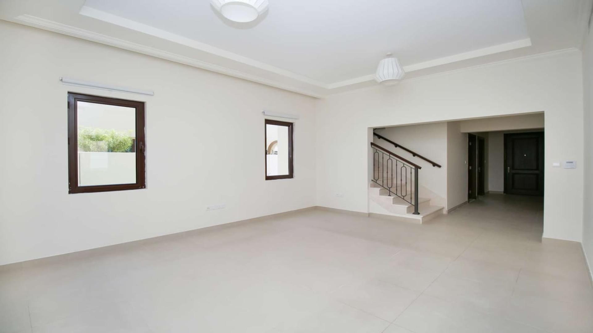 Spacious living room in Lila villa, Arabian Ranches 2, with large windows and natural light