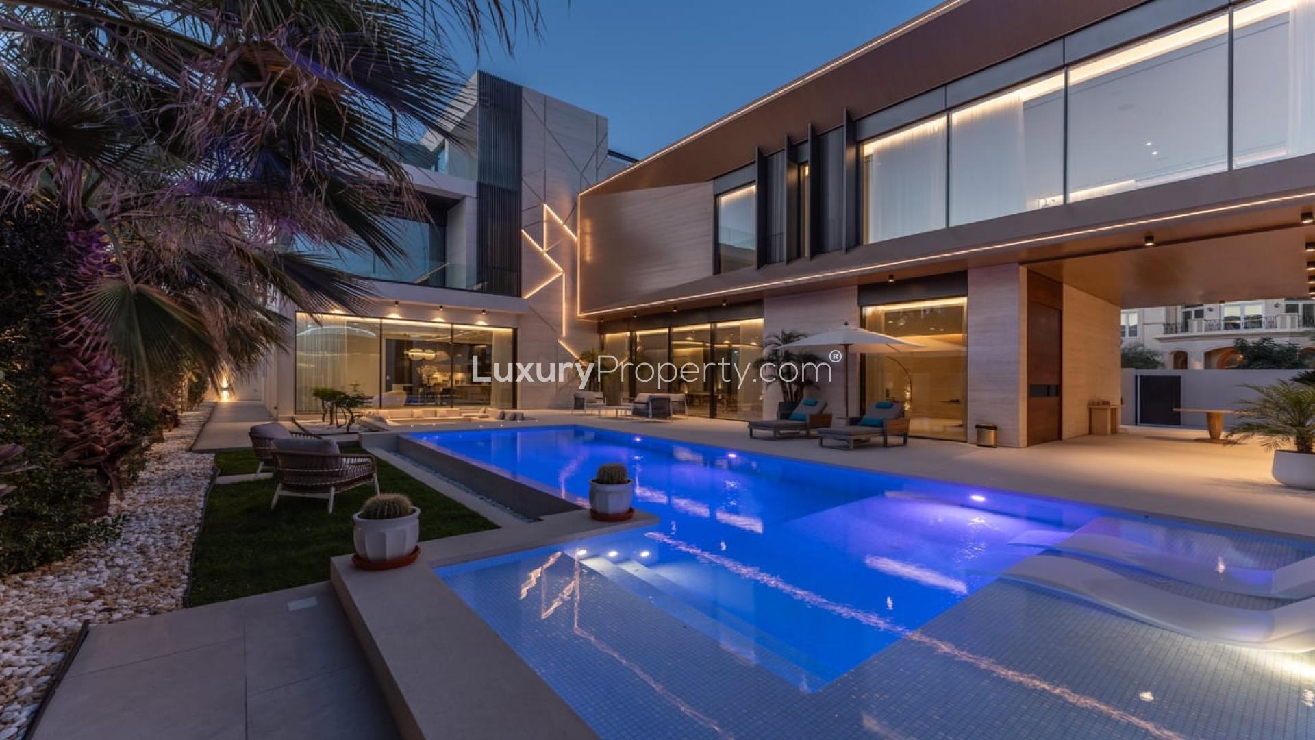 Desert landscape with distant city skyline, Pearl Jumeirah, Dubai real estate view