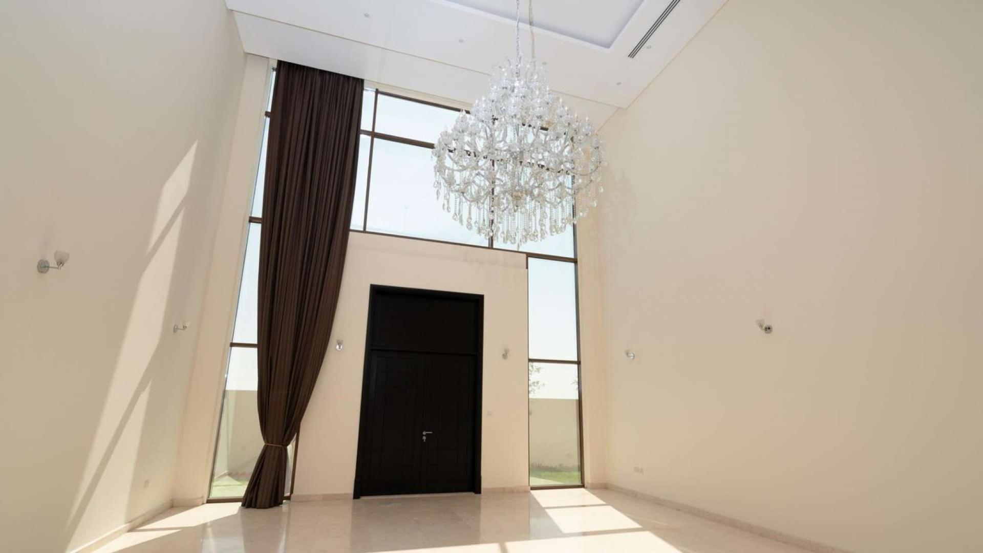 Modern 5-bedroom villa exterior in Meydan Gated Community, single row corner unit