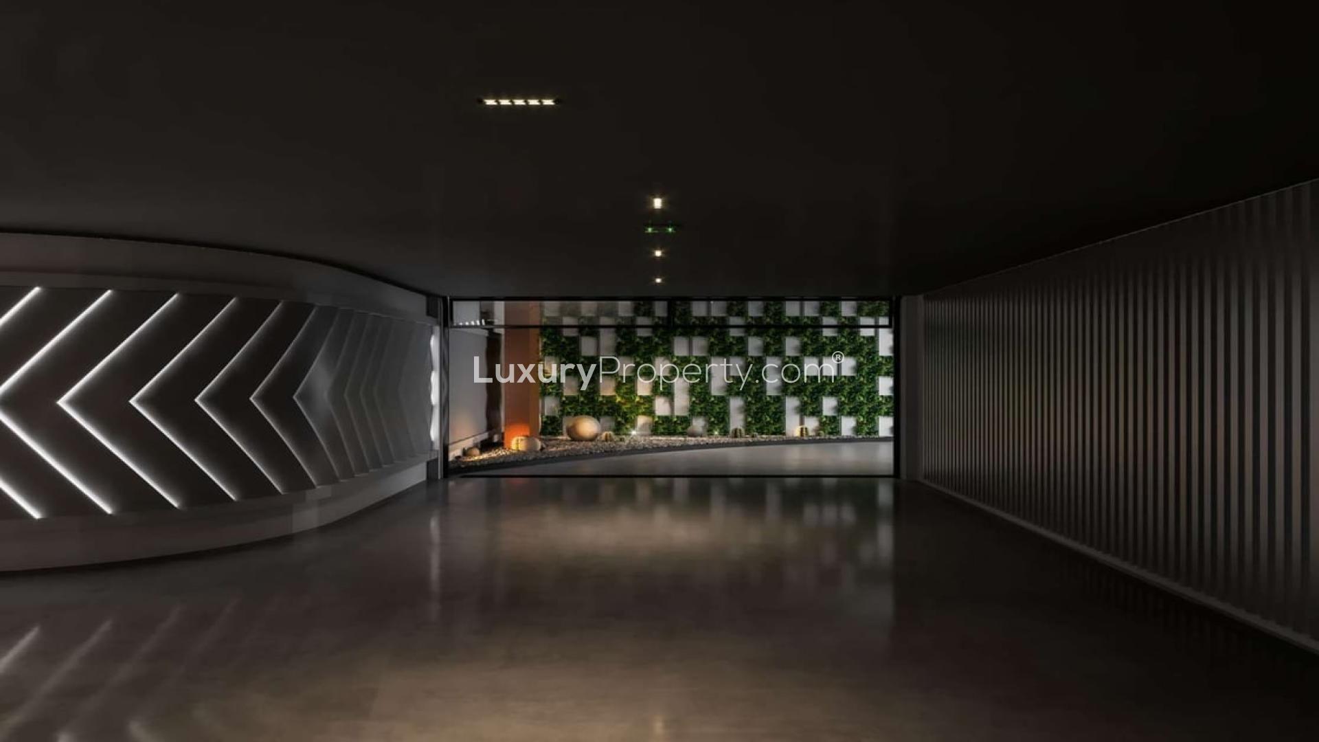 Modern Palm Jumeirah villa with pool, lush garden, and contemporary architecture for sale