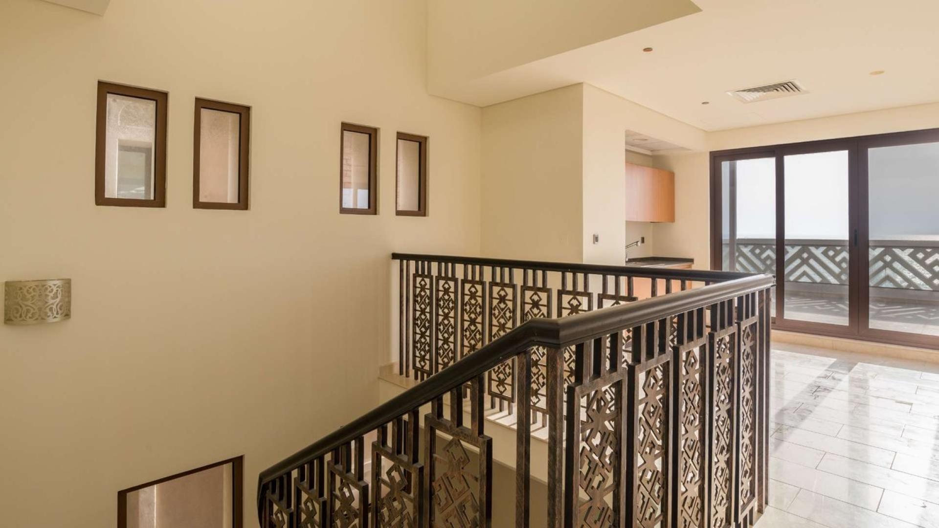 Beachfront villa terrace with ocean view, hot tub, in Palm Jumeirah's Kingdom of Sheba